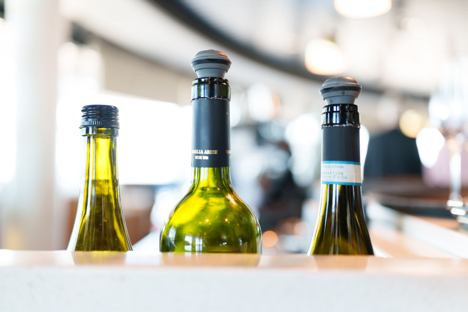 Sony a7R V sample photo. Restaurant bottles photography