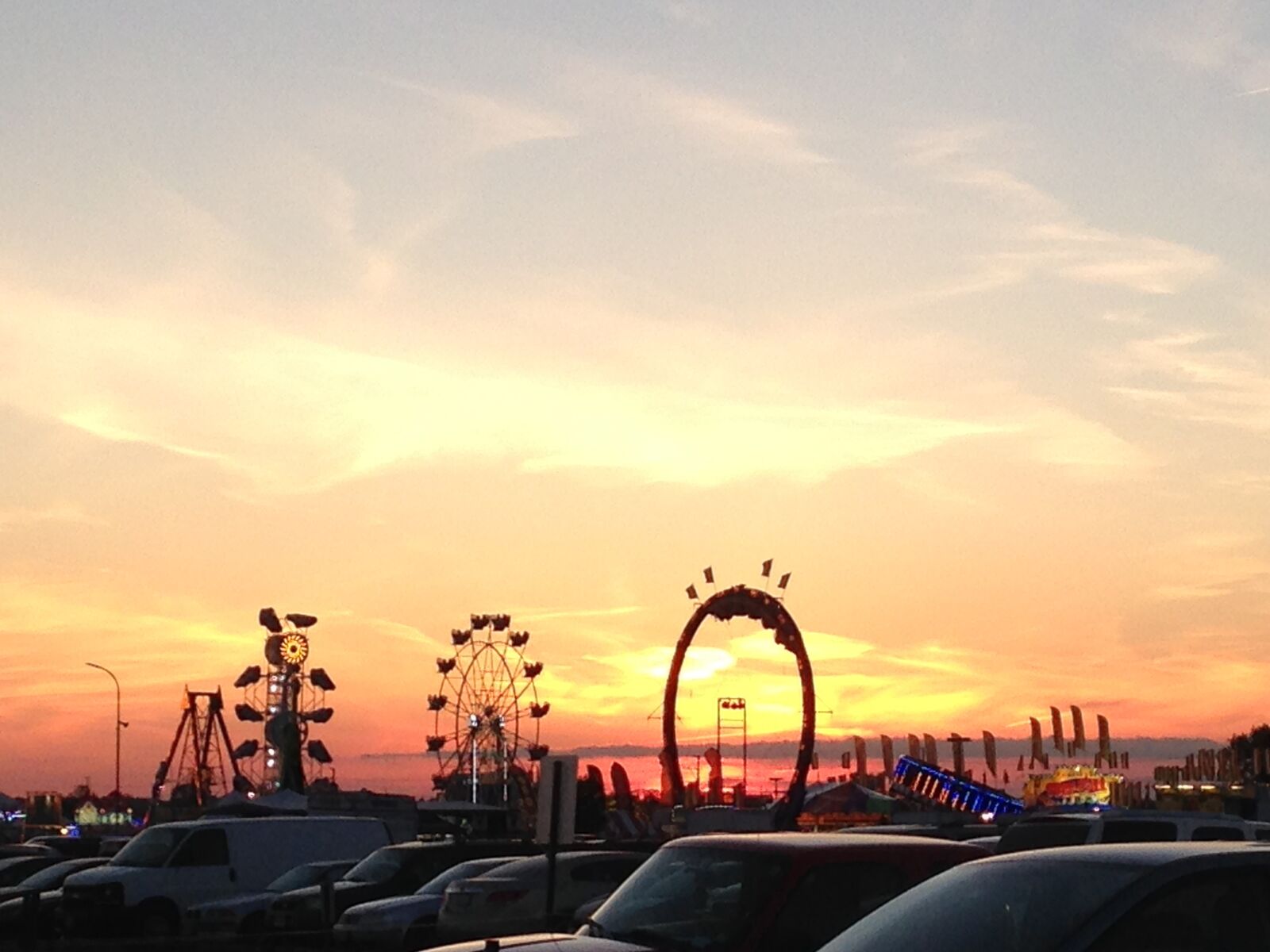 iPhone 5c back camera 4.12mm f/2.4 sample photo. Carnival, sunset, summer photography