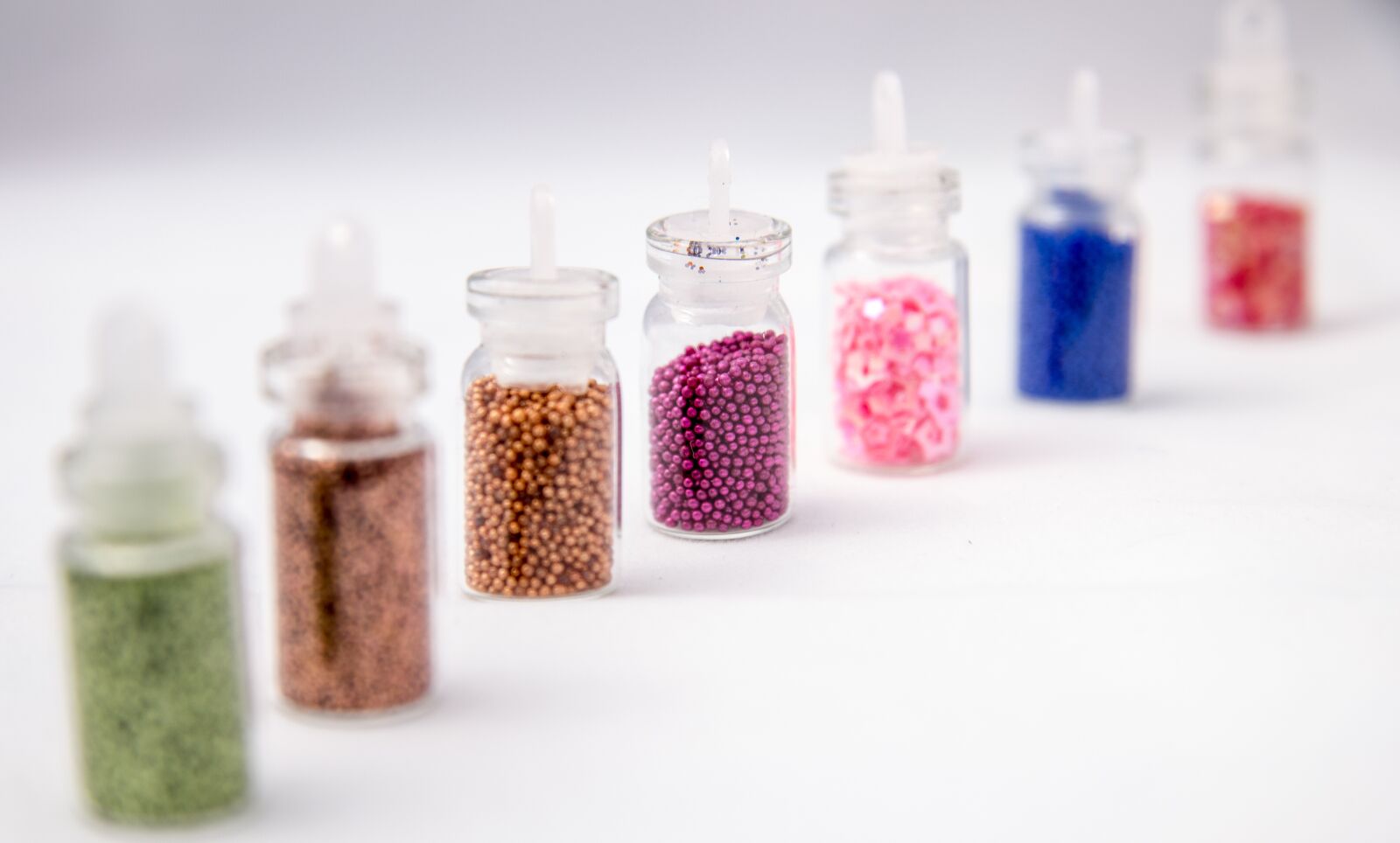 Canon EOS 100D (EOS Rebel SL1 / EOS Kiss X7) sample photo. Jars, tinsel, capacity photography