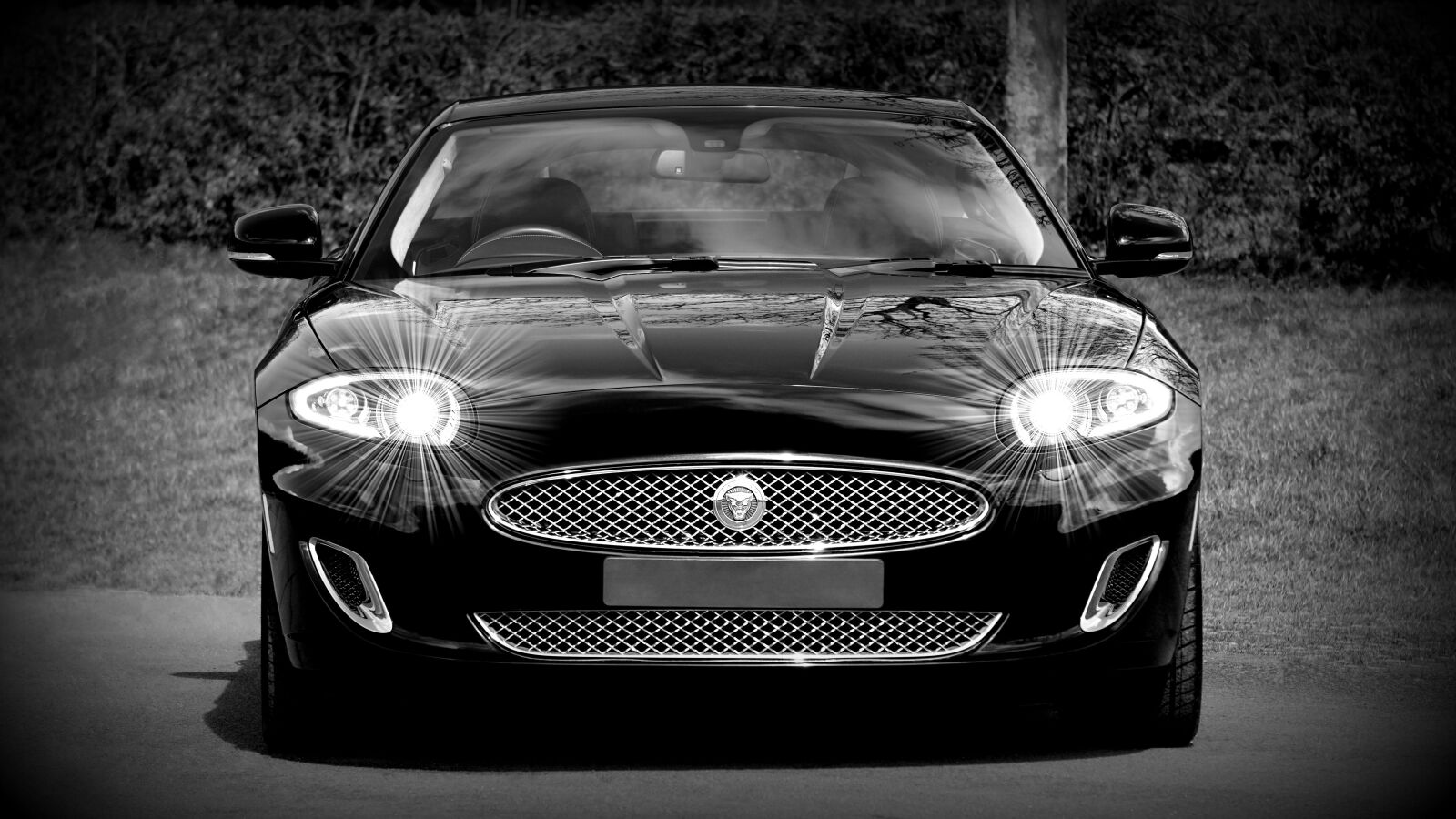 Sony E 55-210mm F4.5-6.3 OSS sample photo. Jaguar, car, vehicle photography