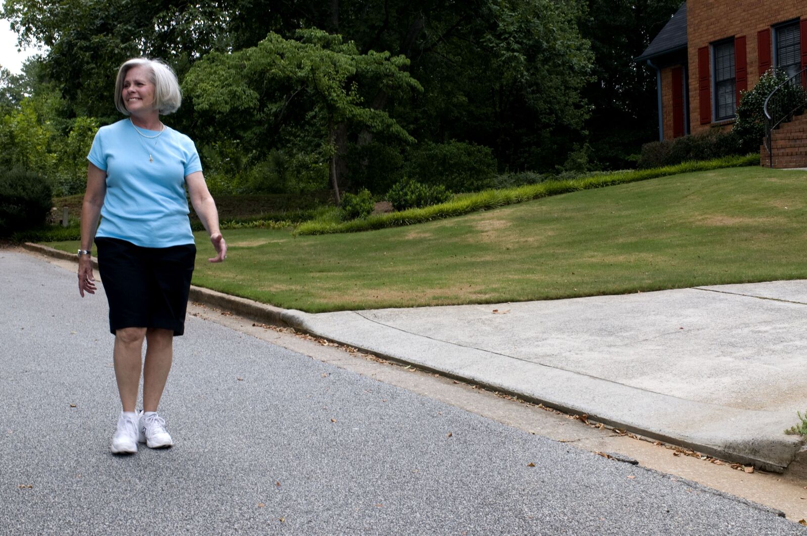 Nikon D300 sample photo. Older woman, walking photography