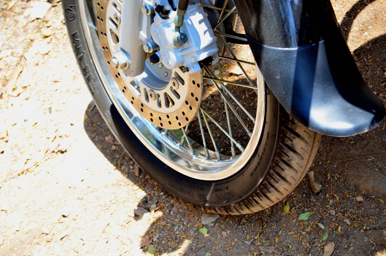 Nikon D5100 sample photo. Motorcycle, wheel, metal gear photography