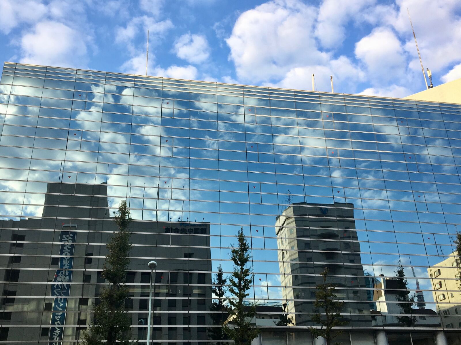Apple iPhone 6s sample photo. Tokyo, glass, facade photography