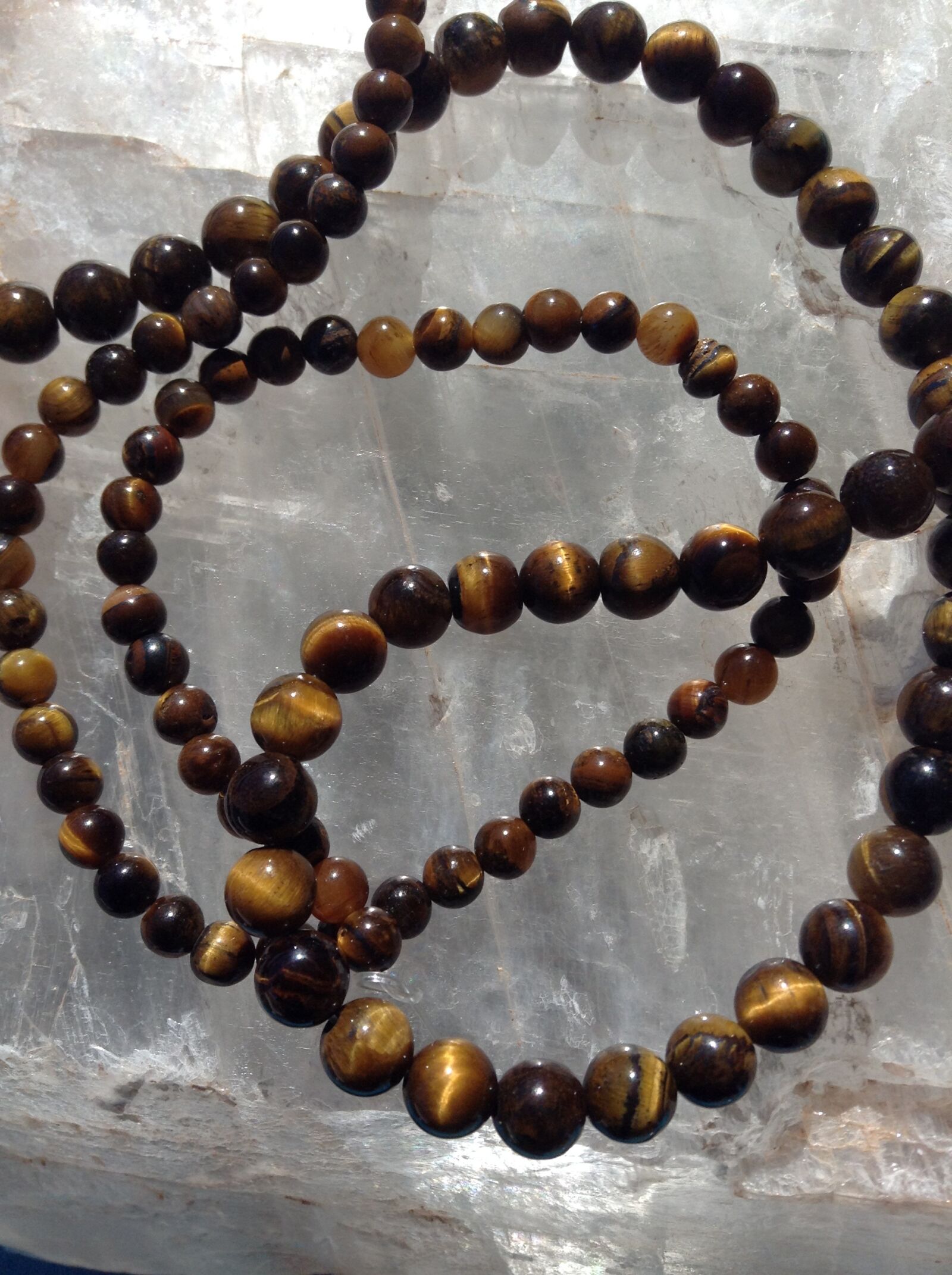 Apple iPad mini sample photo. Tiger's eye beads, gemstone photography