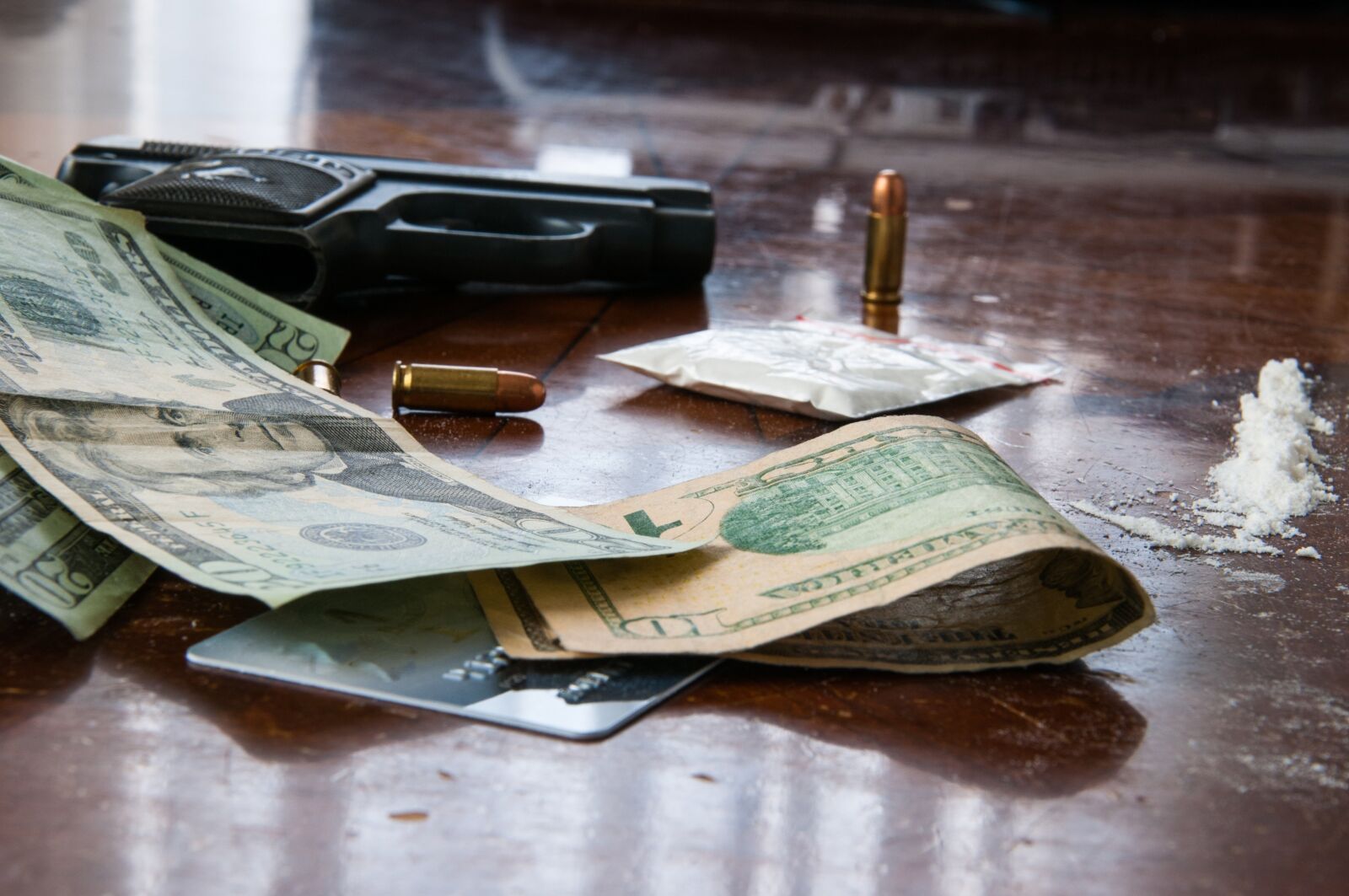 Nikon D300 sample photo. Gun, money, crime photography