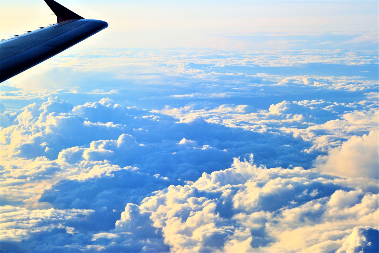 Canon EF 24-105mm F4L IS USM sample photo. Plane, clouds, sky photography
