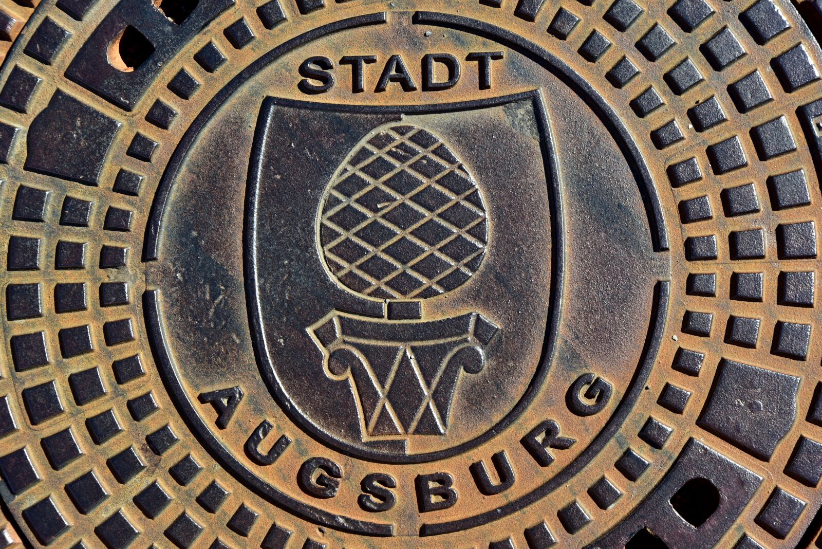 Nikon D750 sample photo. Augsburg, manhole cover, coat photography