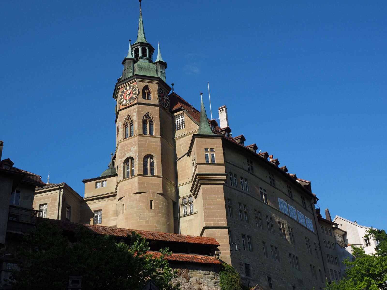 Olympus OM-D E-M1 + Olympus M.Zuiko Digital ED 12-40mm F2.8 Pro sample photo. Town hall, fribourg, city photography