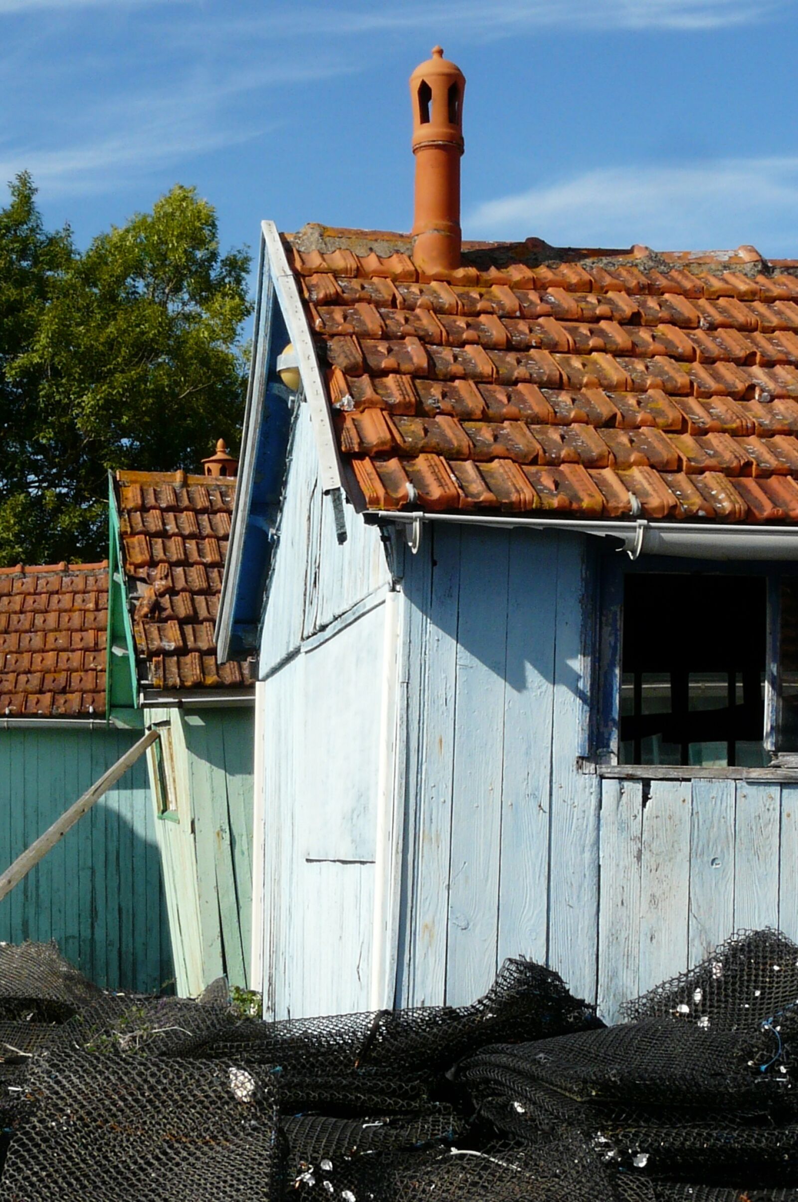 Panasonic DMC-FZ18 sample photo. Fishermen's cabins, oysters networks photography