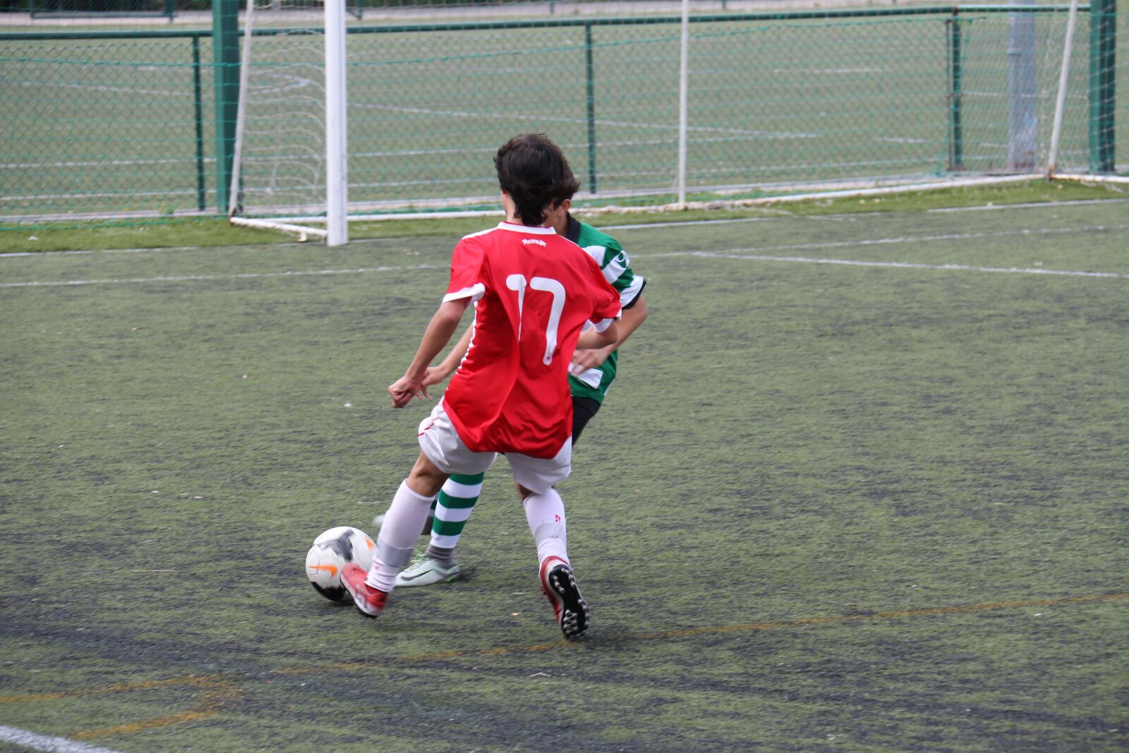 Canon EF-S 18-200mm F3.5-5.6 IS sample photo. Move, player, football photography