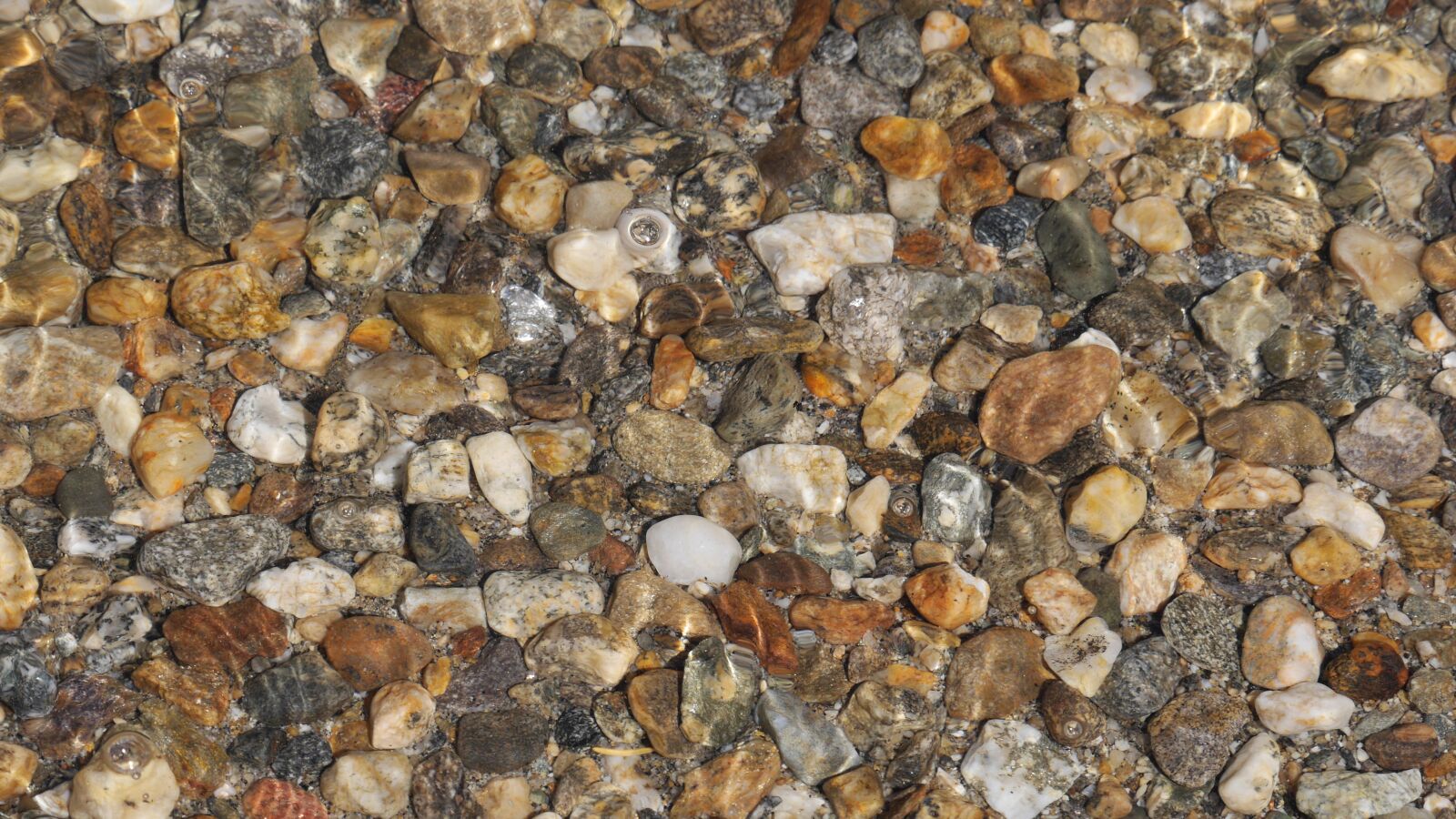 Panasonic Lumix DMC-GH3 sample photo. Stones, covered with water photography
