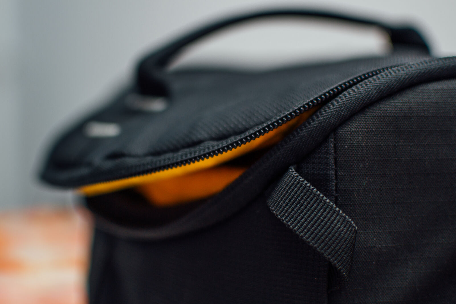 Nikon D3100 + Nikon AF-S DX Nikkor 35mm F1.8G sample photo. Black, soft, bag photography