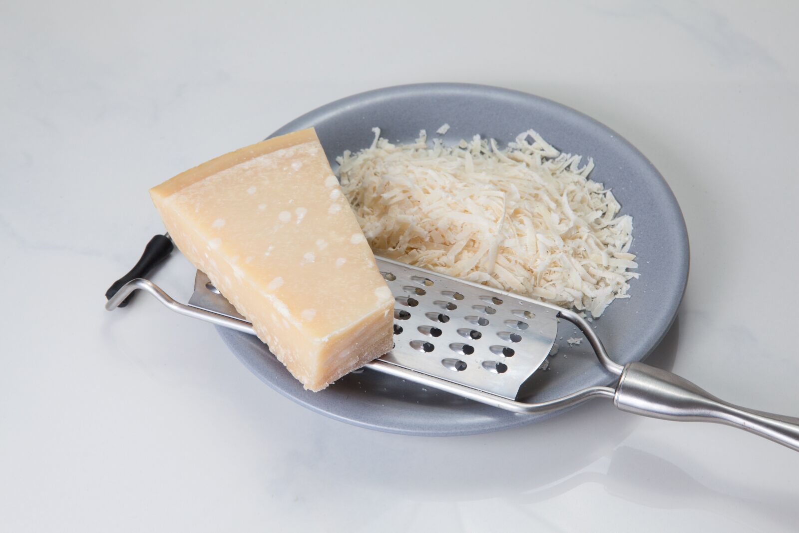Canon EOS 5D Mark II + Canon EF 24-70mm F2.8L USM sample photo. Parmesan, cheese, grater photography