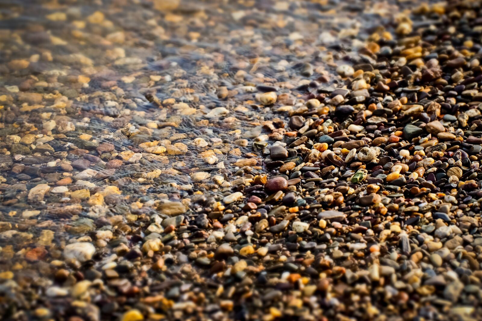 Olympus OM-D E-M10 sample photo. Beach, pebble, water photography