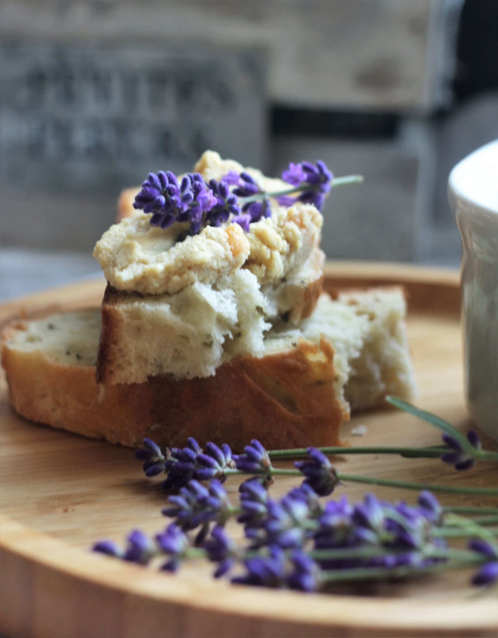 Canon EOS 600D (Rebel EOS T3i / EOS Kiss X5) + Canon EF 50mm F1.8 II sample photo. Lavender, bread, herbs photography
