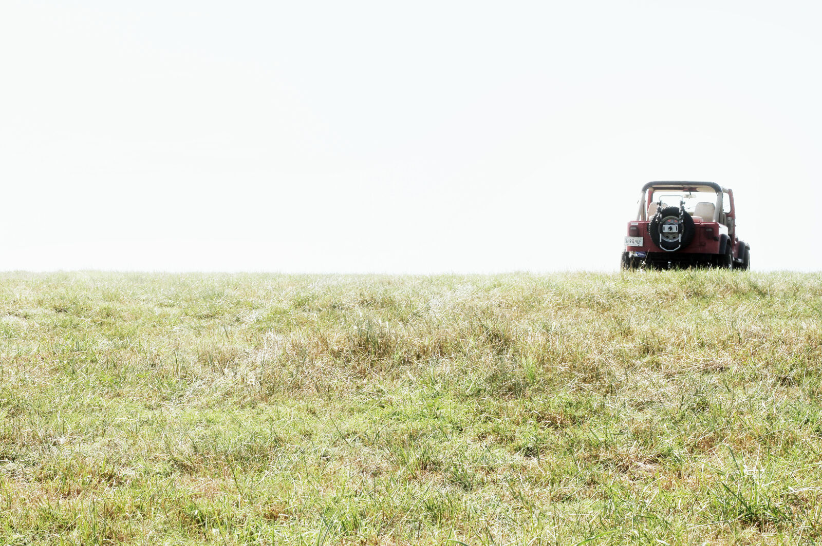 Canon EOS 7D + Canon EF 50mm F1.4 USM sample photo. Tractor, on, field, against photography
