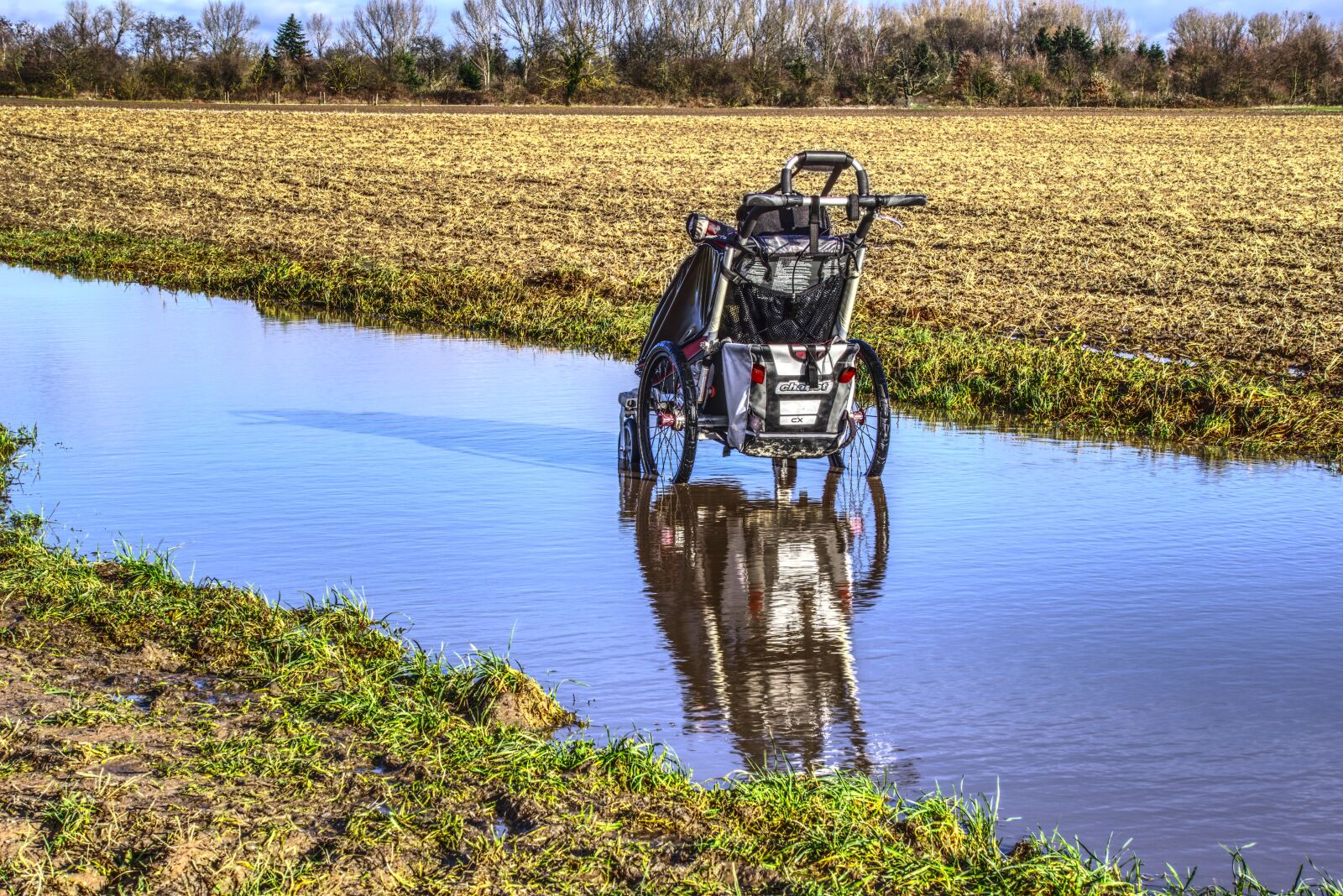 Sony E 55-210mm F4.5-6.3 OSS sample photo. Puddle, mirroring, reflect photography