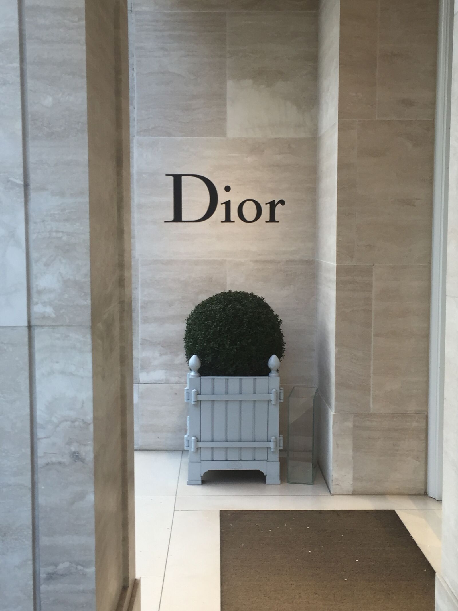 iPhone 6 back camera 4.15mm f/2.2 sample photo. Boutique, christian, dior, clothing photography