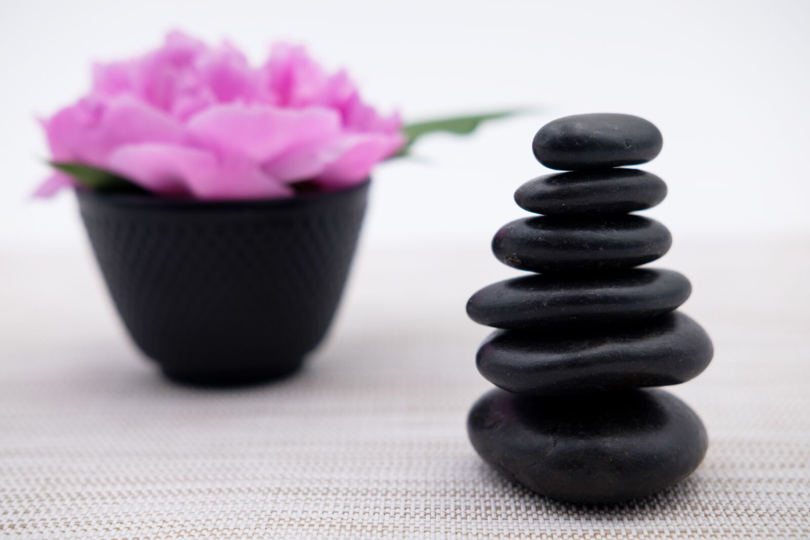 Fujifilm X-T2 + Fujifilm XF 35mm F2 R WR sample photo. Stones, cairn, massage photography
