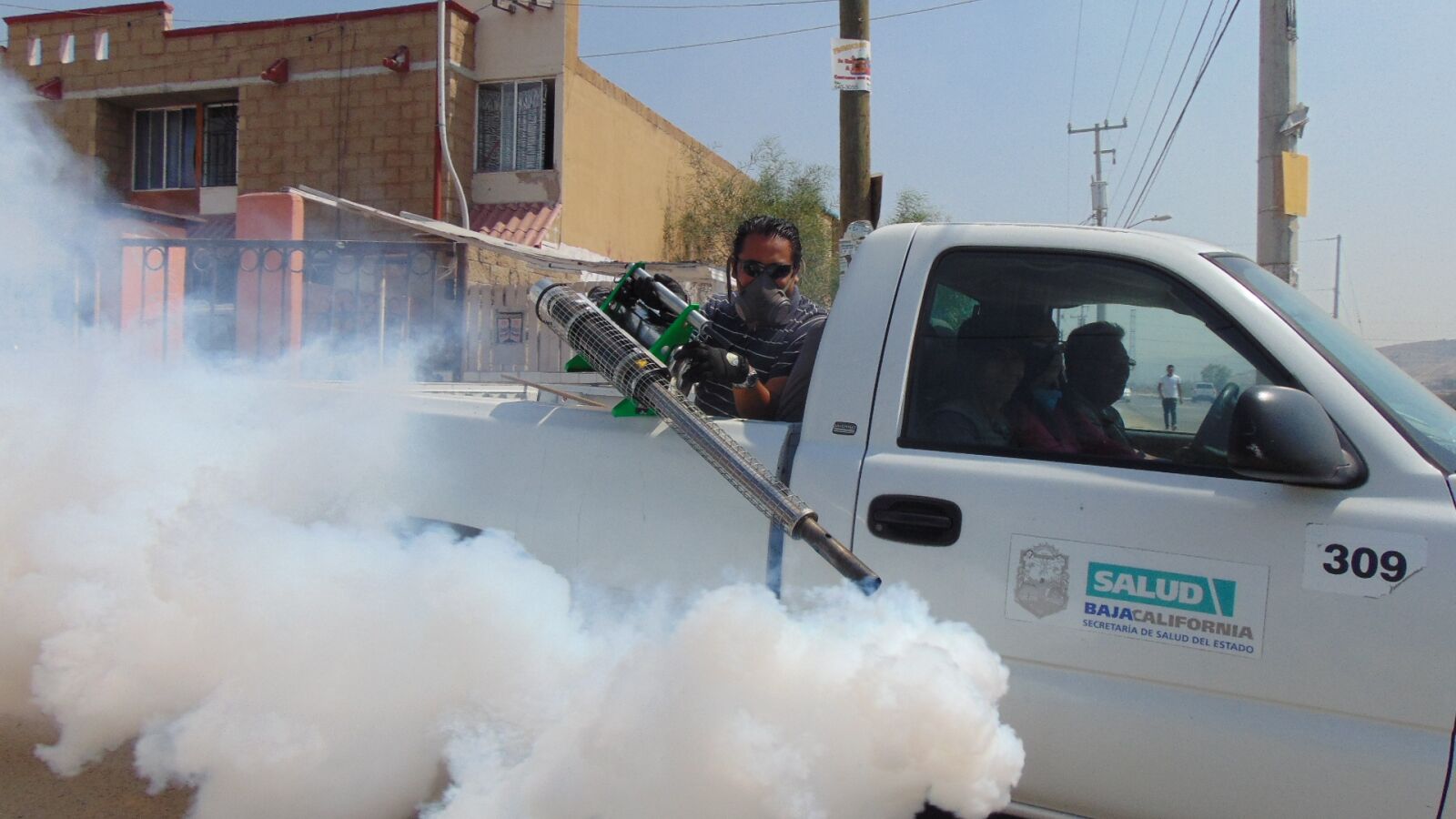Sony Cyber-shot DSC-H300 sample photo. Fumigation, street, pesticide photography