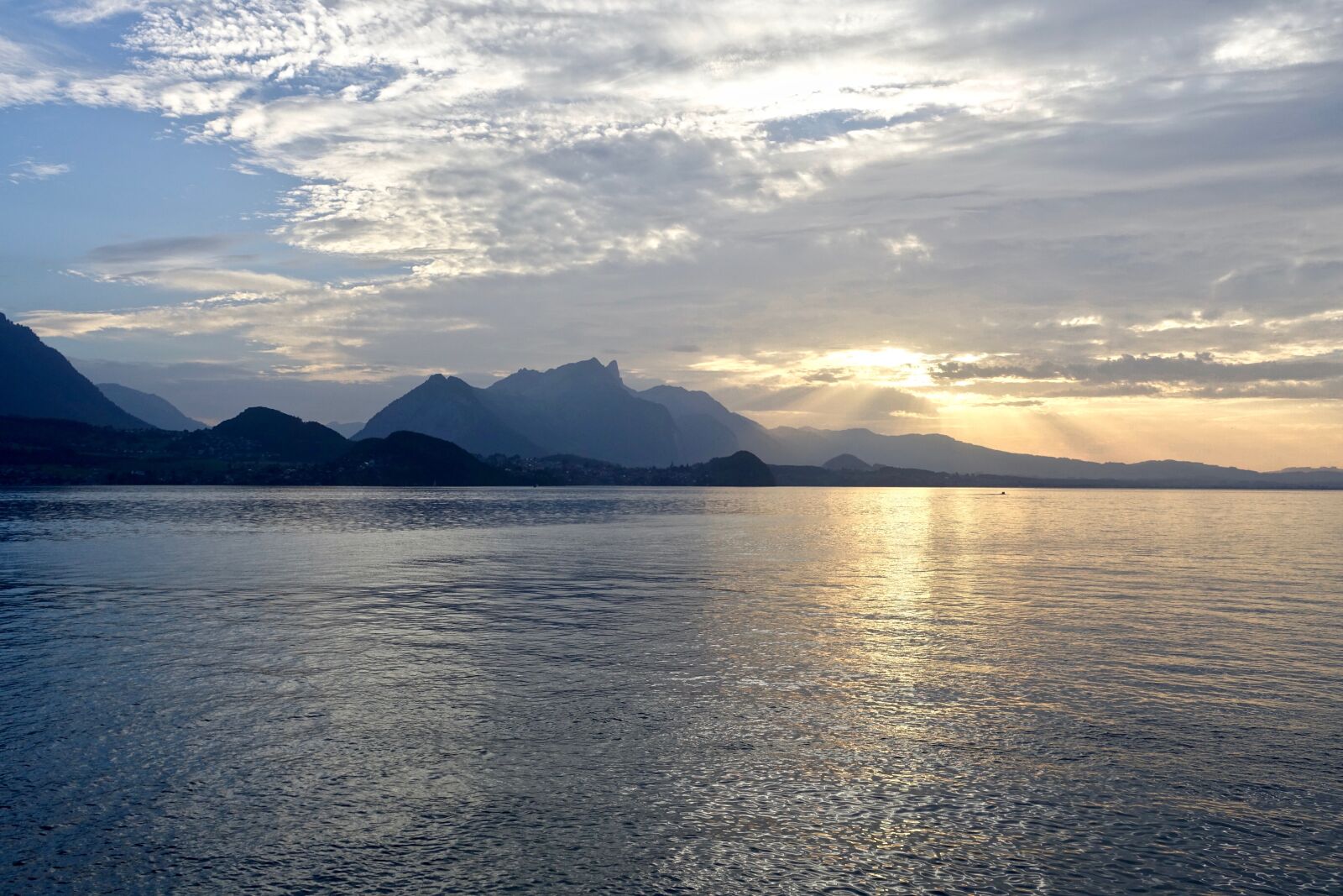 Sony Cyber-shot DSC-RX100 III sample photo. Sunset, mountains, glisten photography