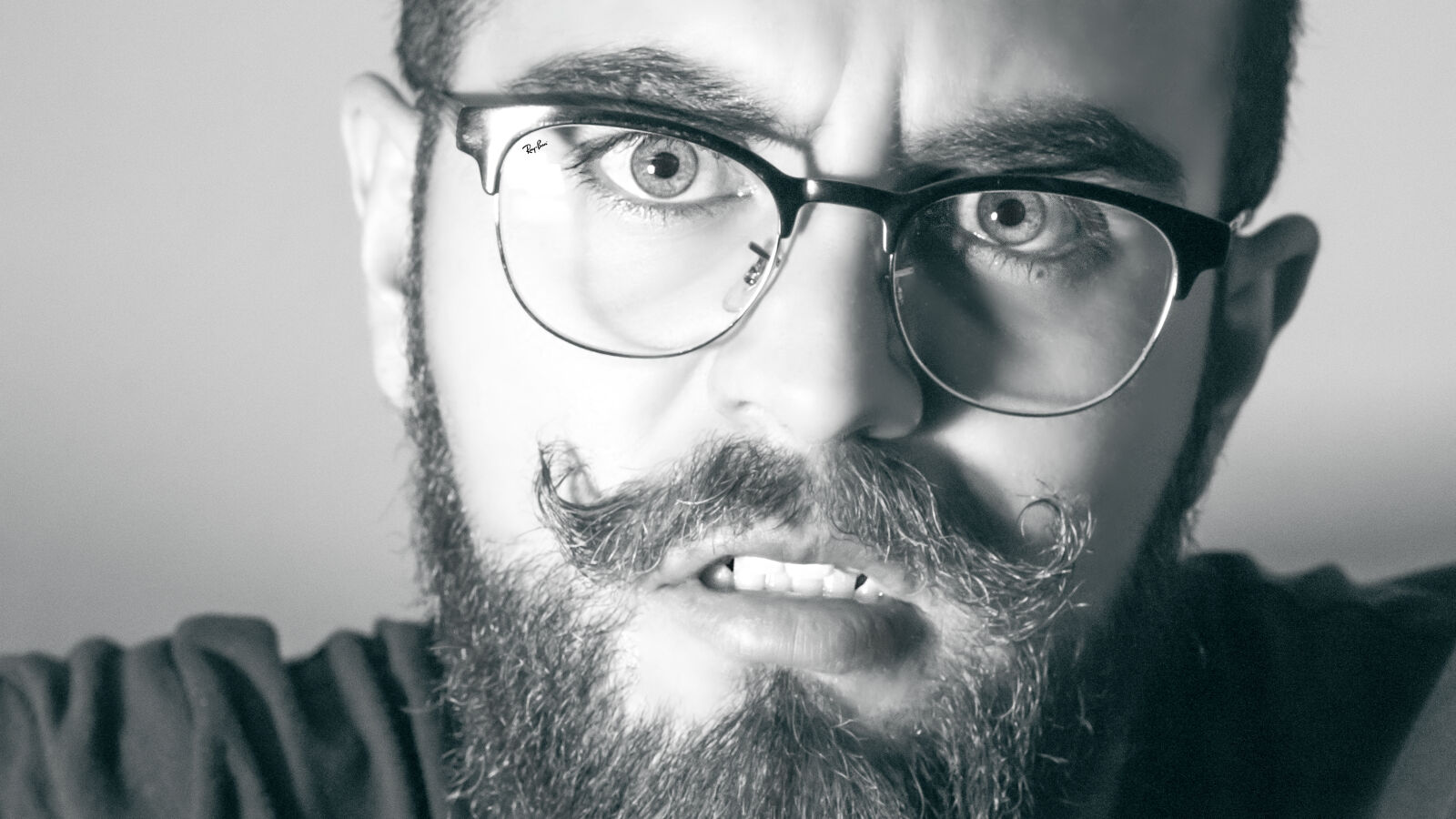 Canon EOS 700D (EOS Rebel T5i / EOS Kiss X7i) sample photo. Adult, beard, black, and photography