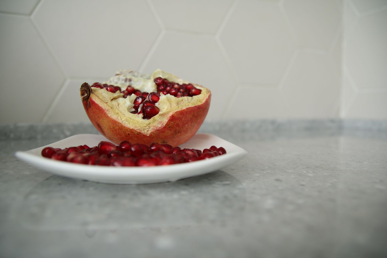 Tamron SP AF 17-50mm F2.8 XR Di II LD Aspherical (IF) sample photo. Pomegranate, background, fruit photography