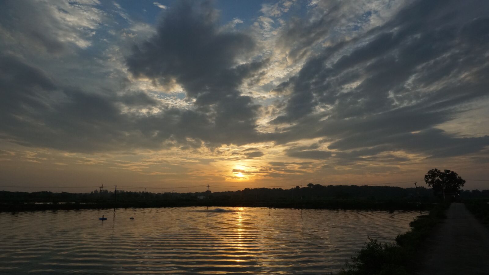 Sony a5100 sample photo. Sunrise, reflection, cloud photography