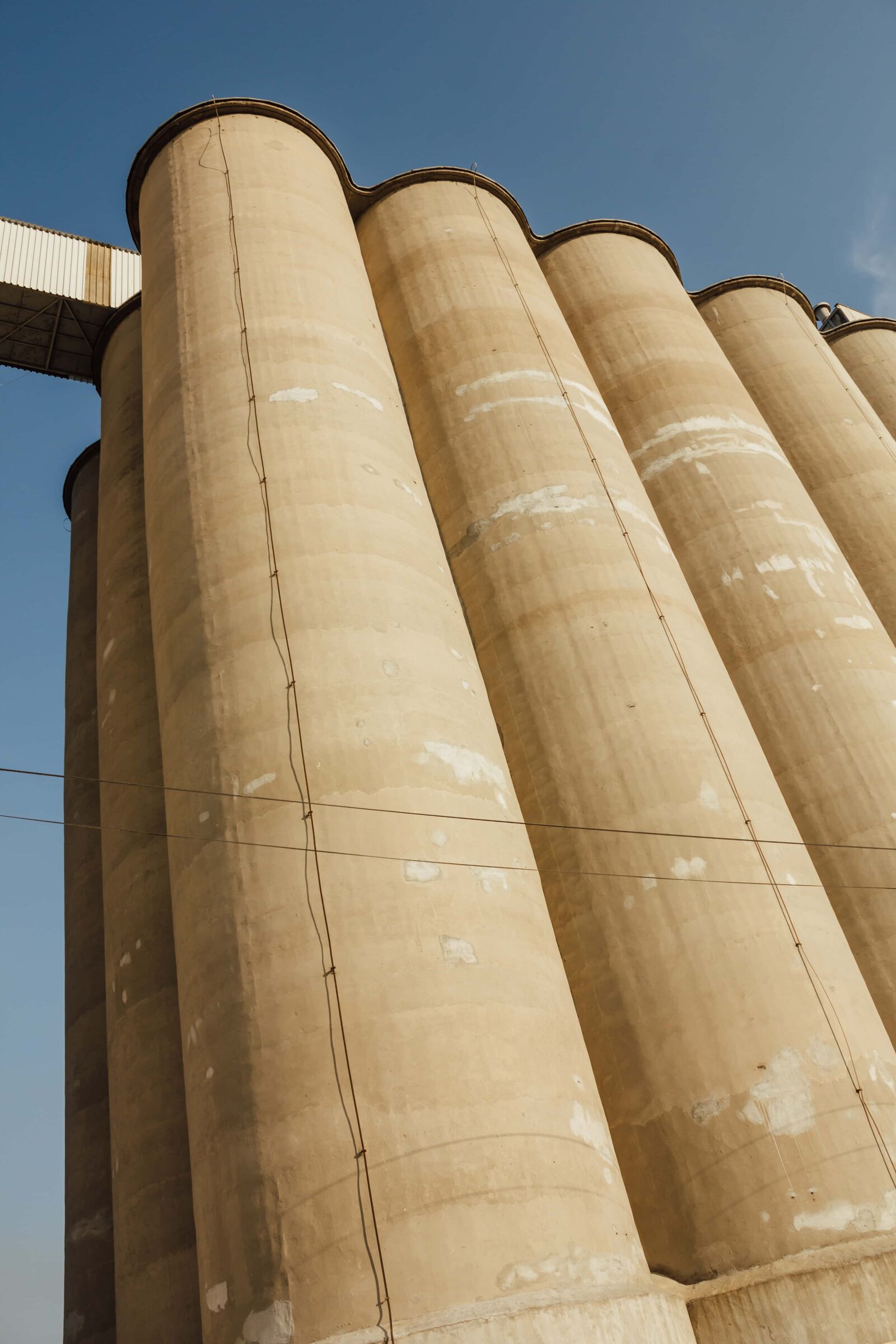 Canon EF-S 18-55mm F3.5-5.6 IS sample photo. Silo, bedrock, perspective, tall photography