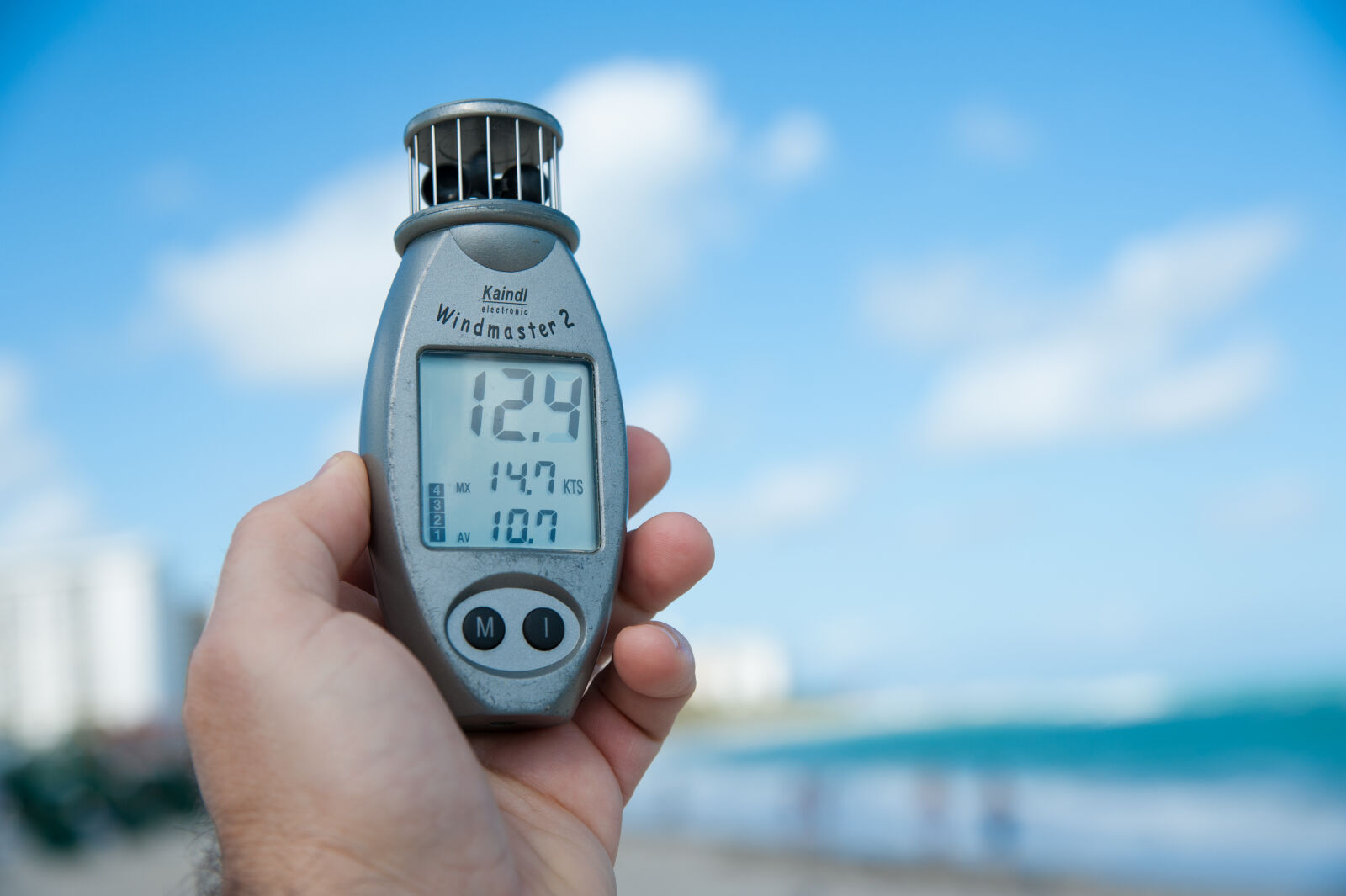 Nikon D700 sample photo. Blue, sky, hand, holding photography