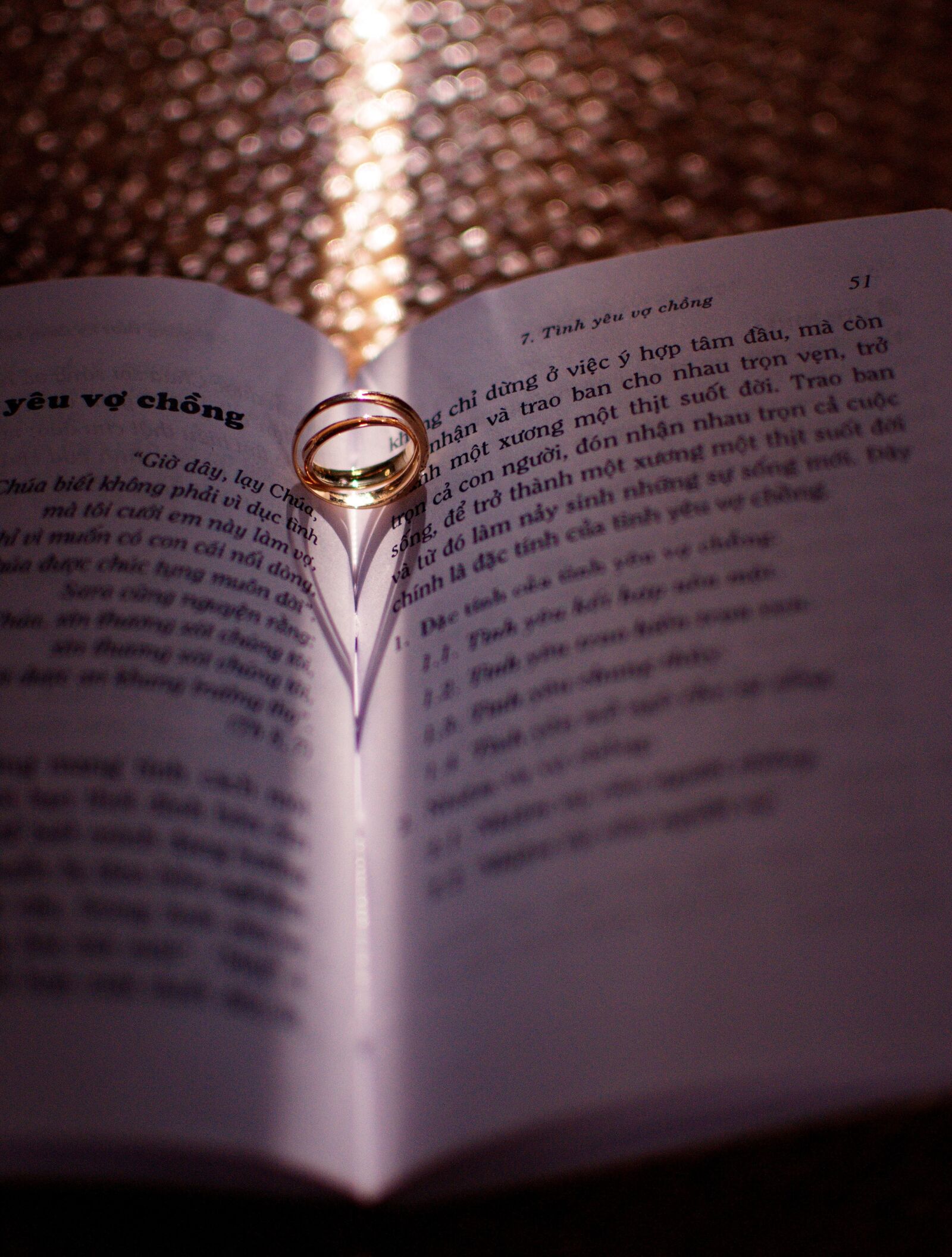 Nikon D300S sample photo. Ring love, book, light photography