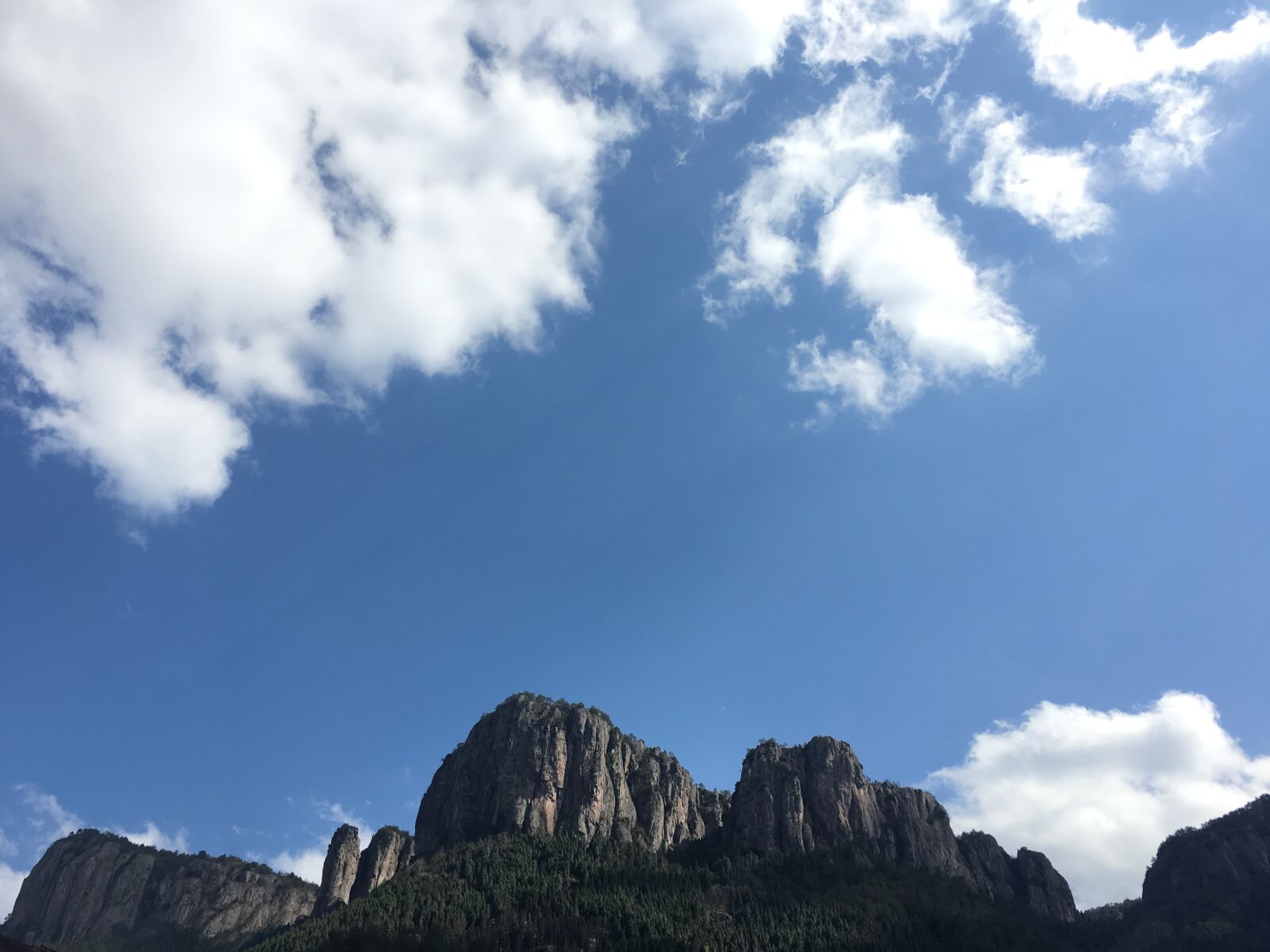 Apple iPhone 6s sample photo. Blue sky, cliff, white photography