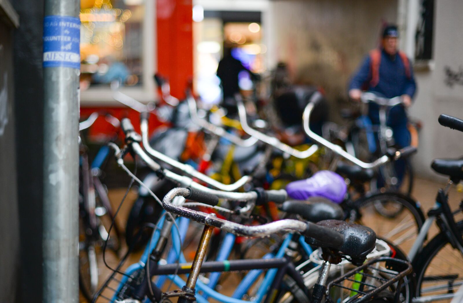 Nikon D610 sample photo. Parked, bikes, netherlands photography