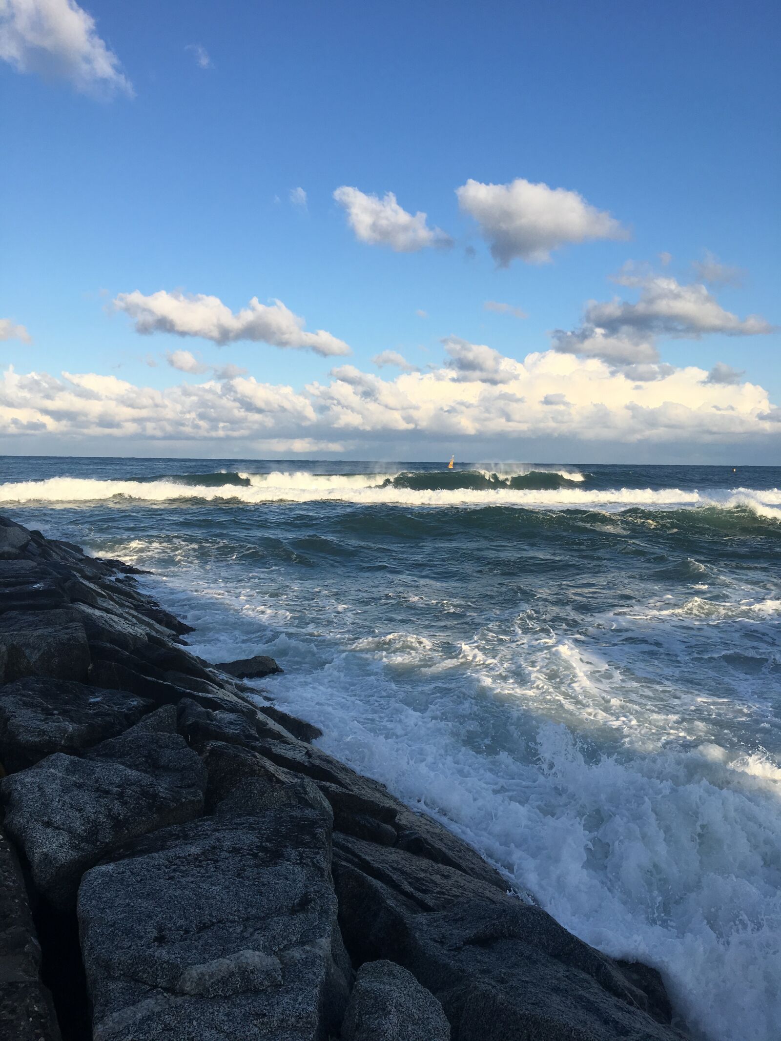 iPhone 6s back camera 4.15mm f/2.2 sample photo. Sea, breakwater, sky photography