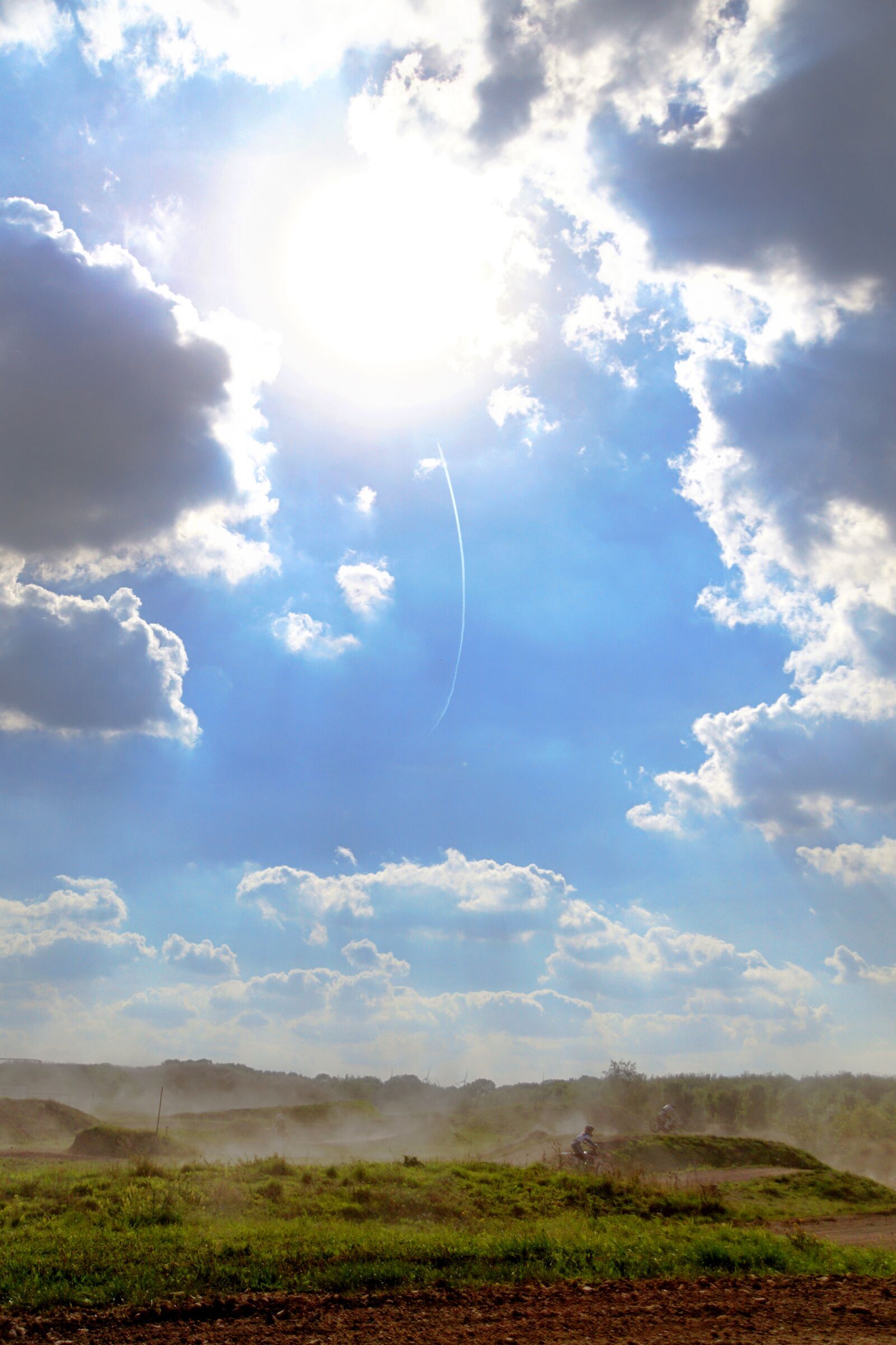 Sony ILCA-77M2 + DT 18-270mm F3.5-6.3 SSM sample photo. Sky, sun, motocross photography