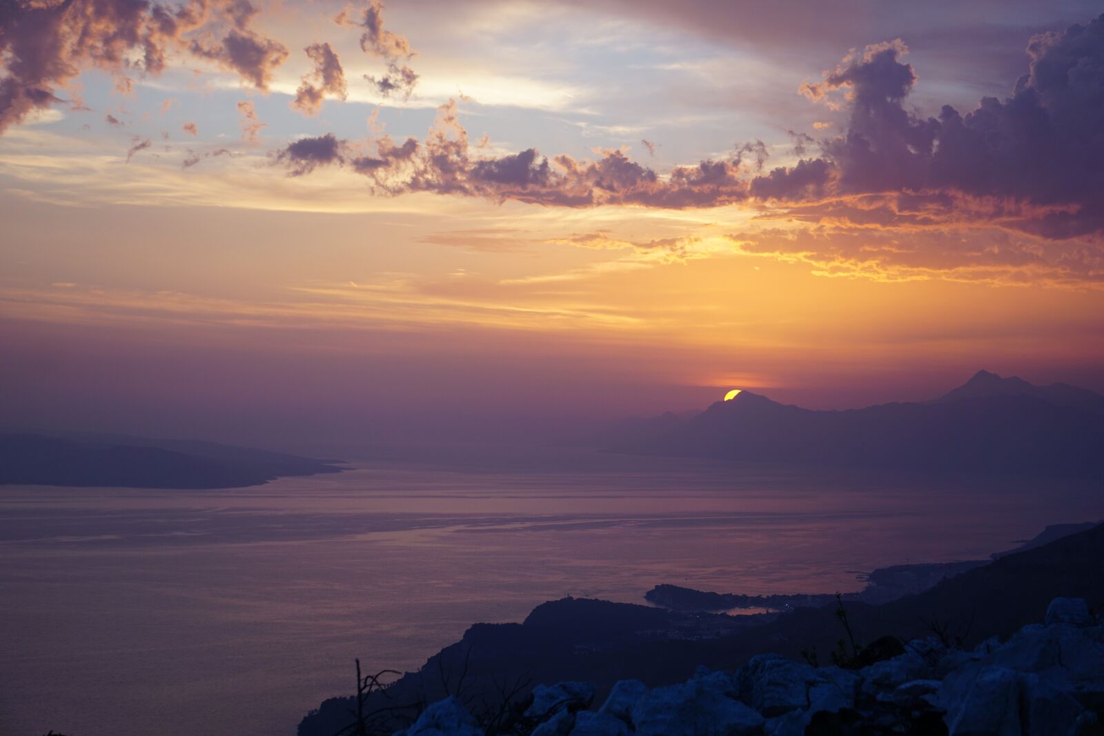 Sony E 55-210mm F4.5-6.3 OSS sample photo. Sea, sunset, mountains photography