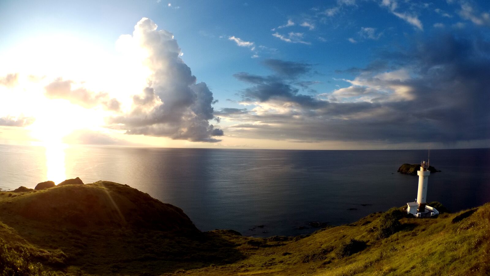 HTC RE sample photo. Lighthouse, sea, sky photography