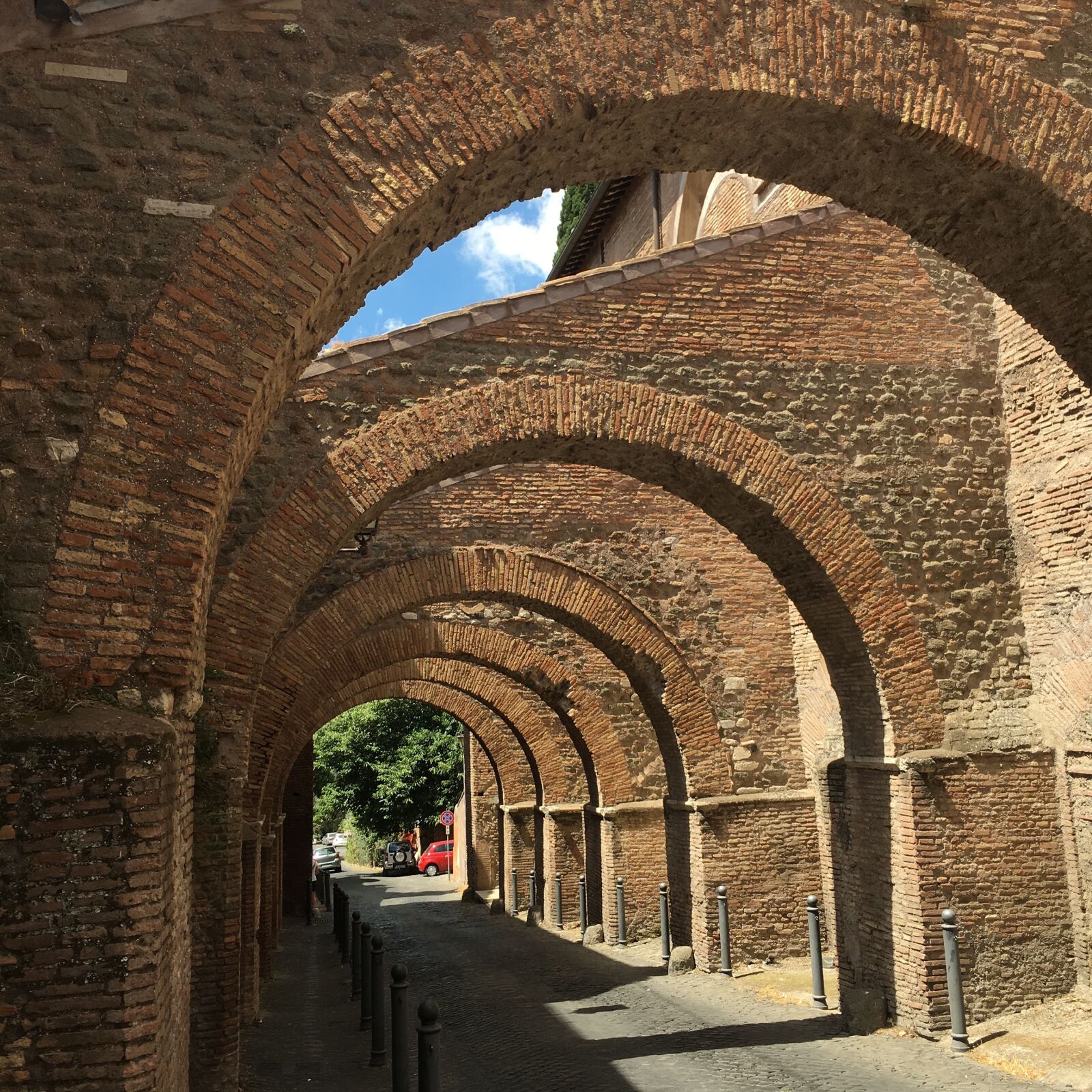 Apple iPhone 6s Plus sample photo. Rome, arches, architecture photography