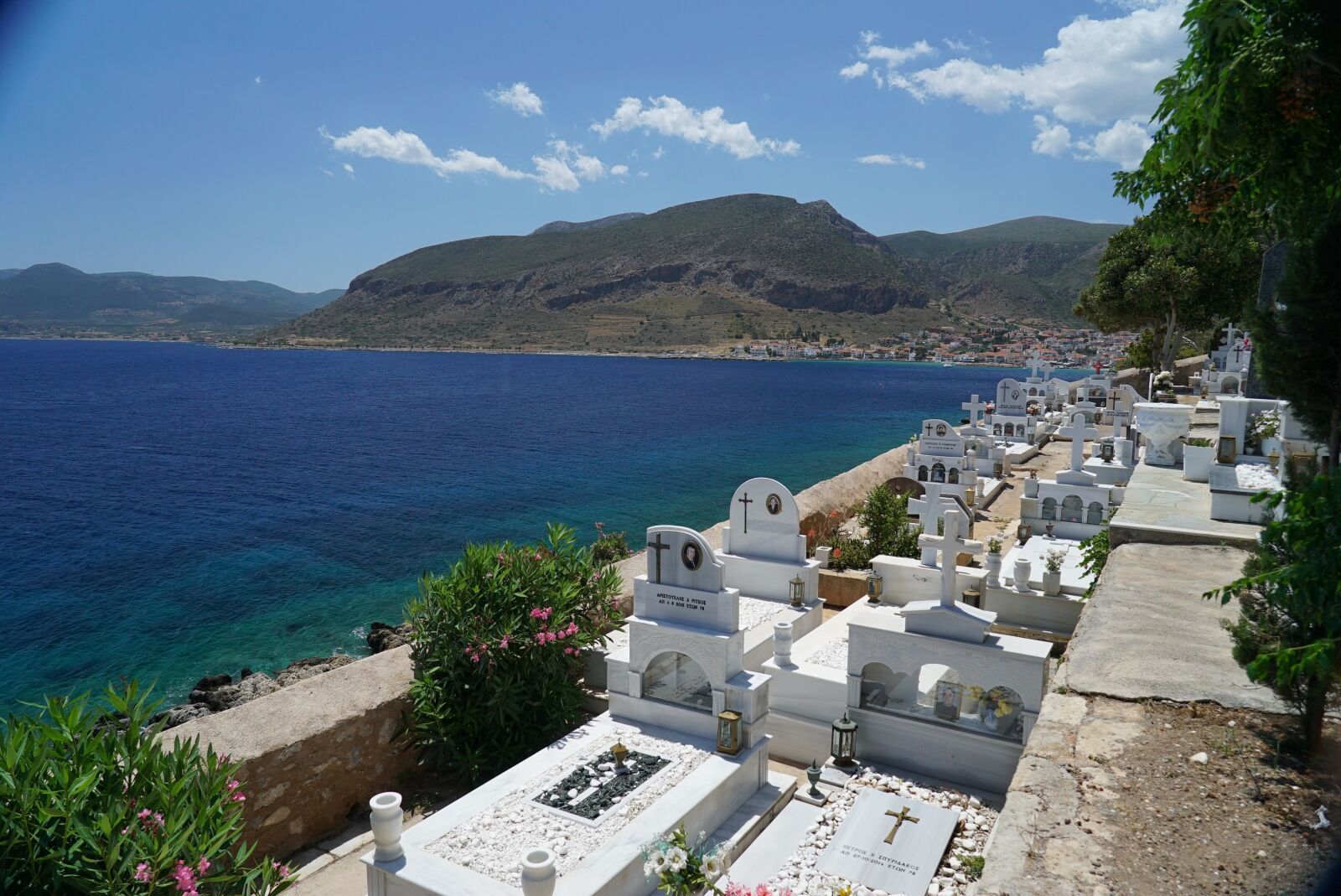 Sony FE 24-105mm F4 G OSS sample photo. Cemetery, sea, mountains photography