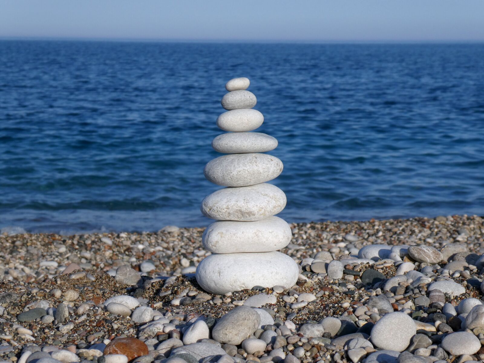 Panasonic DC-TZ91 sample photo. Stones, cairns, stand photography