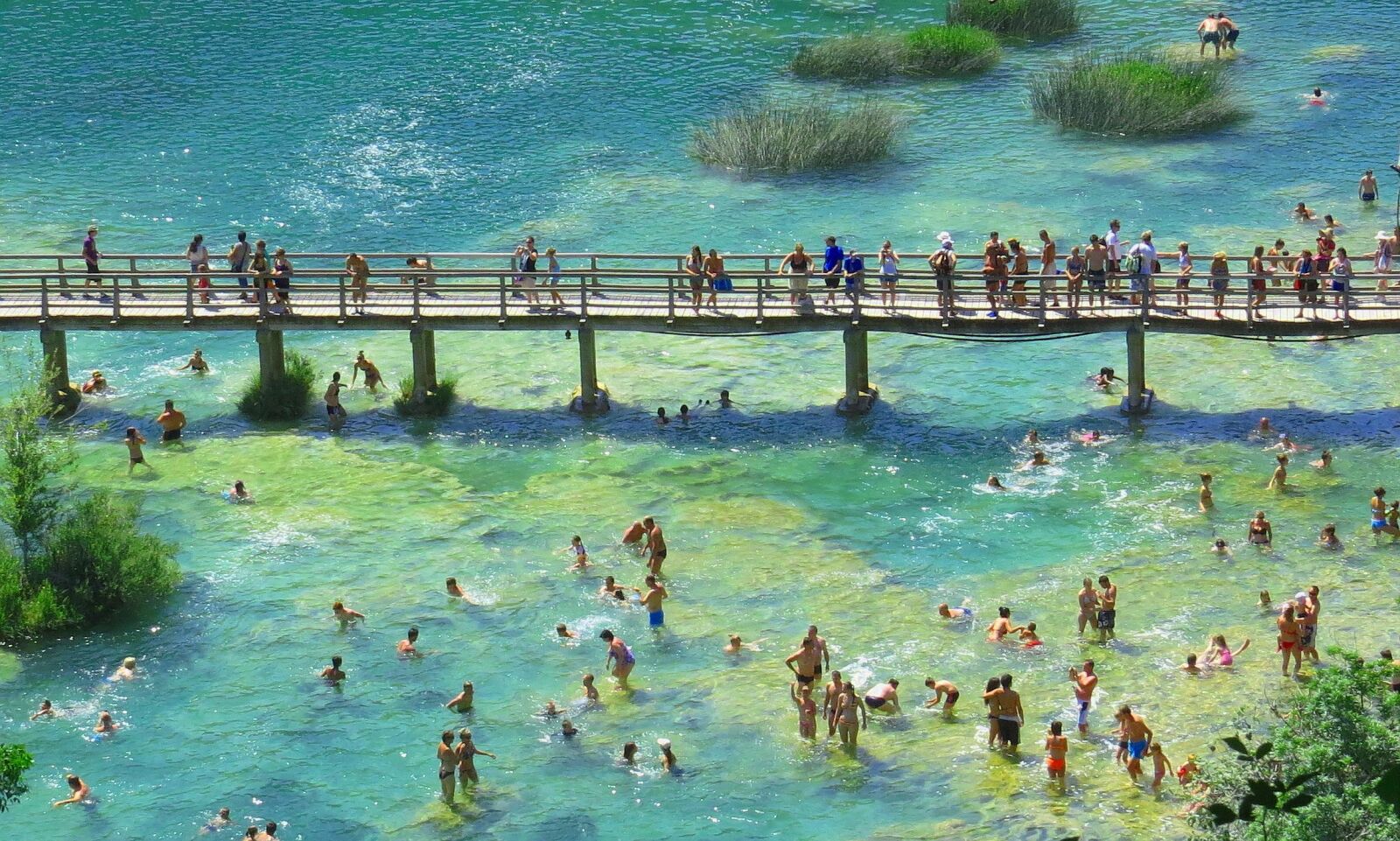 Canon PowerShot SX50 HS sample photo. Bridge, wooden, people photography