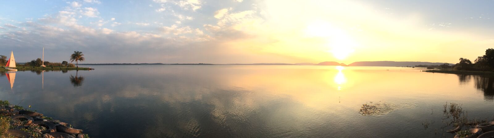 Apple iPhone SE sample photo. Lake, sailboat, sunset photography