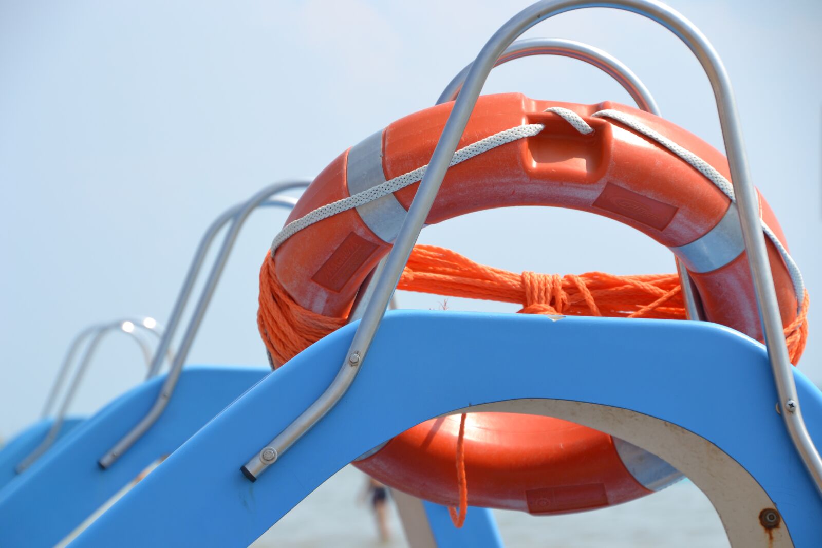 Nikon D3100 sample photo. Lifebelt, pedal boat, sea photography