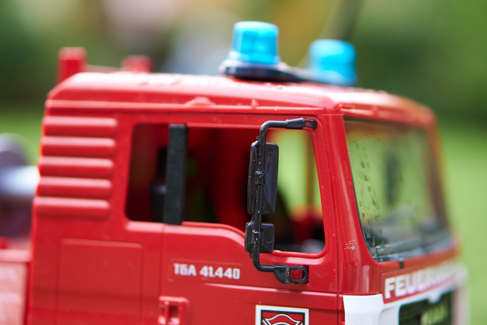 Sony E 50mm F1.8 OSS sample photo. Fire, toys, blue light photography