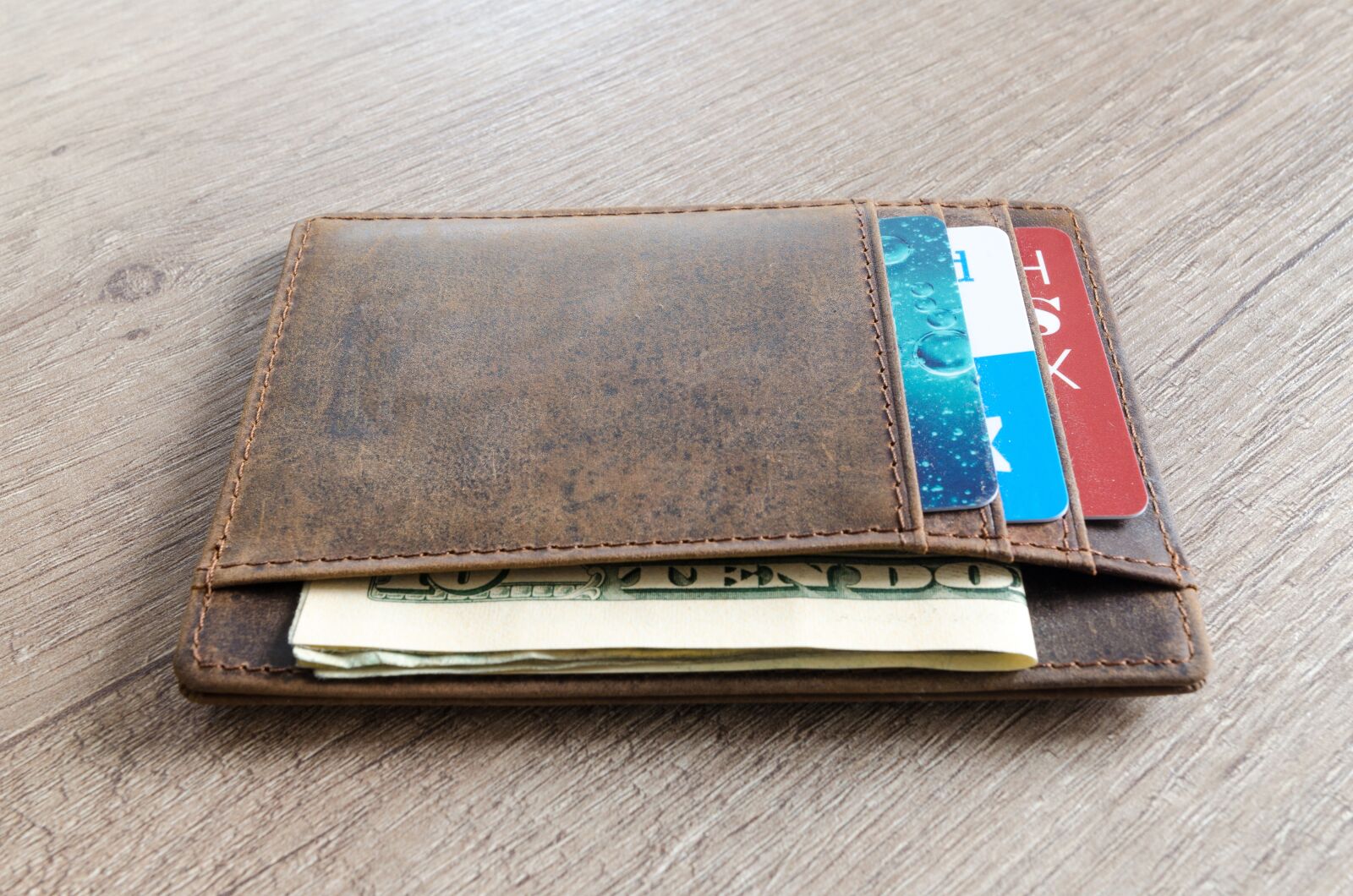 Nikon D5100 sample photo. Leather, finance, money photography