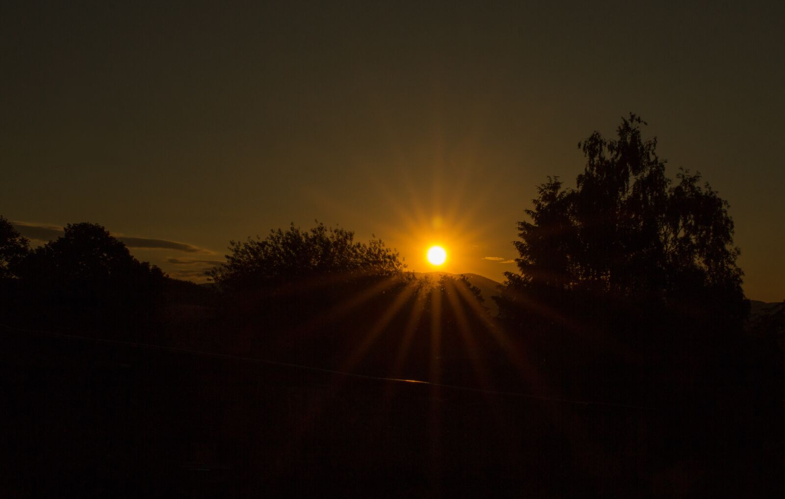 Canon EOS 60D sample photo. Sunset, dark, sunbeam photography