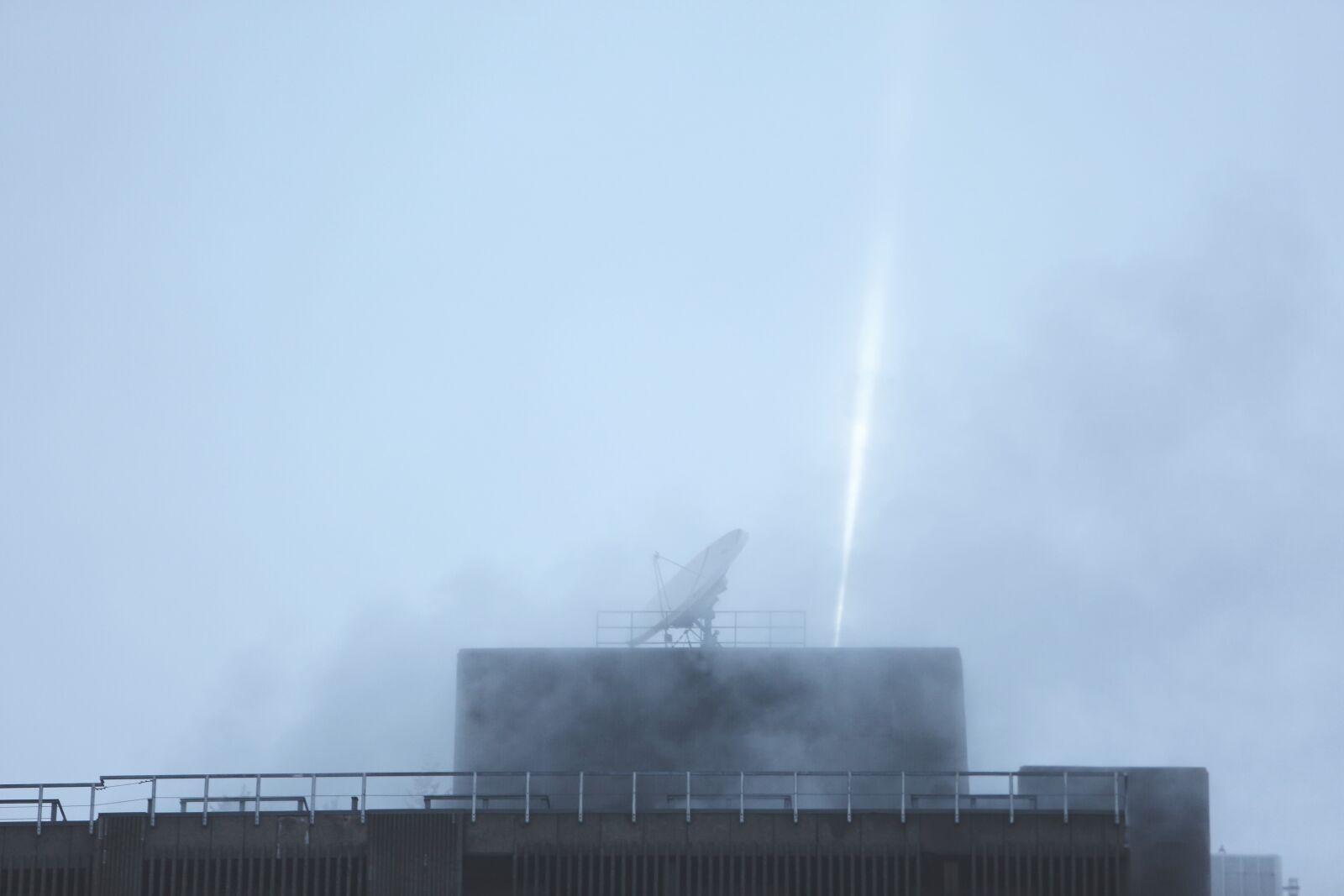 Canon EF 70-200mm F2.8L IS USM sample photo. Rooftop, satellite dish, spotlight photography
