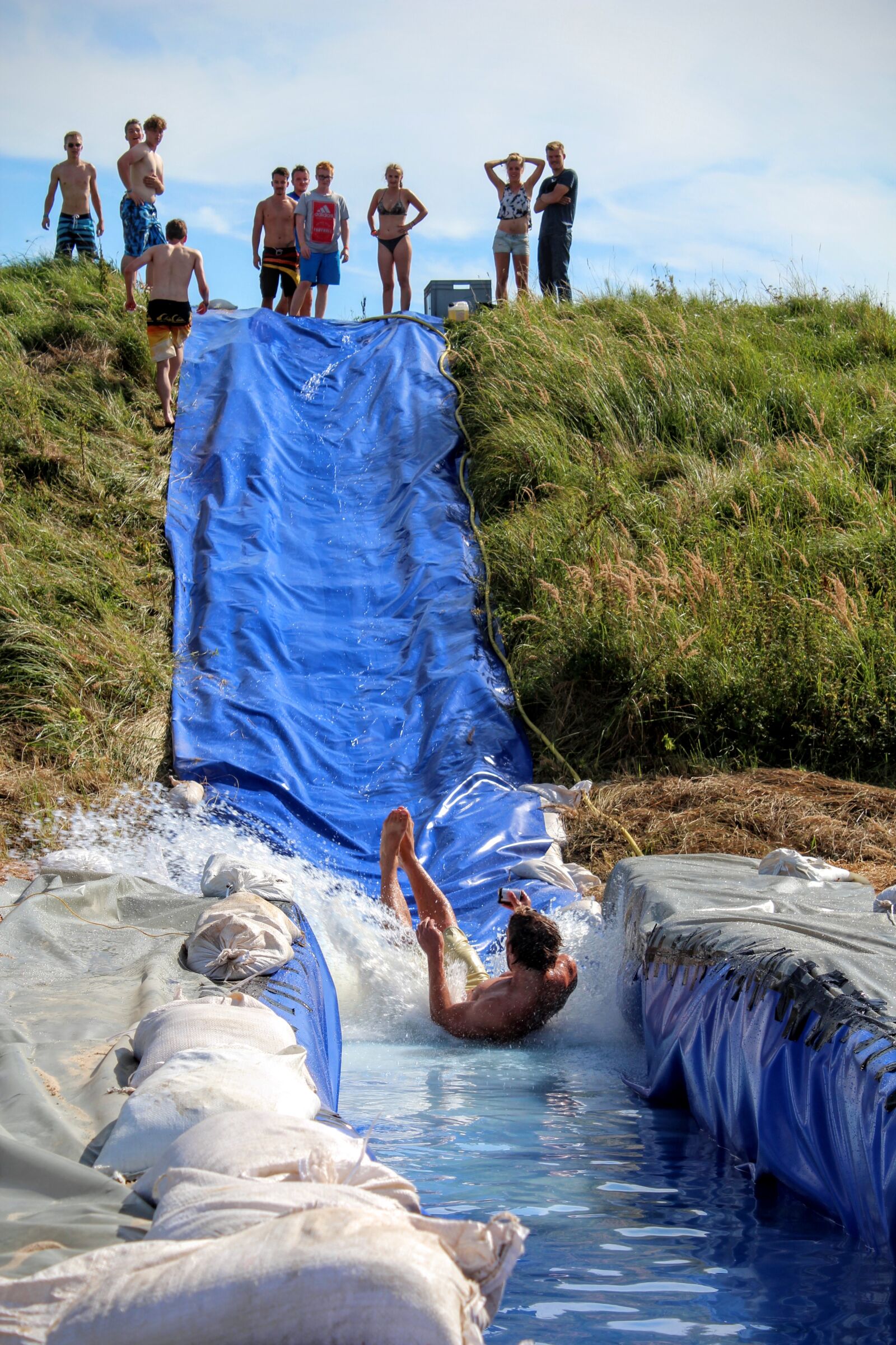 Canon EOS 600D (Rebel EOS T3i / EOS Kiss X5) sample photo. Water slide, fun, children photography