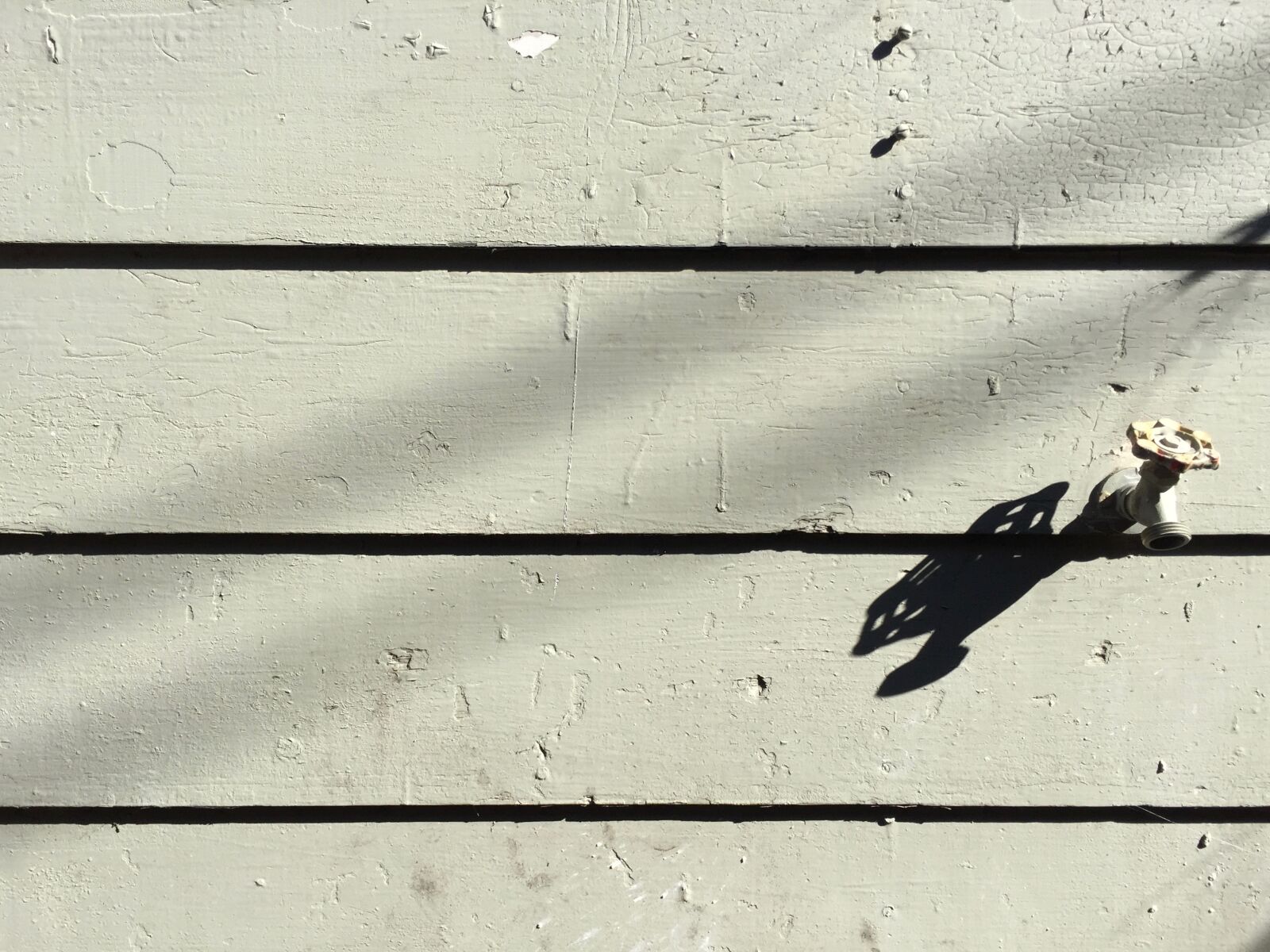 iPhone 6 back camera 4.15mm f/2.2 sample photo. California, drought, faucet, wall photography