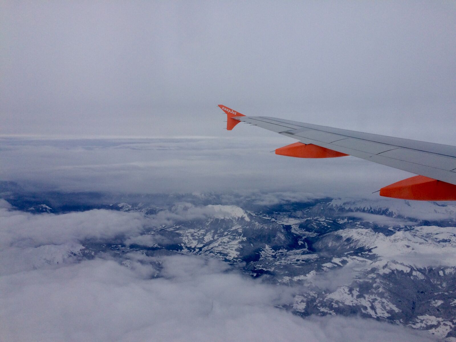 iPhone 5s back camera 4.15mm f/2.2 sample photo. Clouds, mountain, plane, snow photography